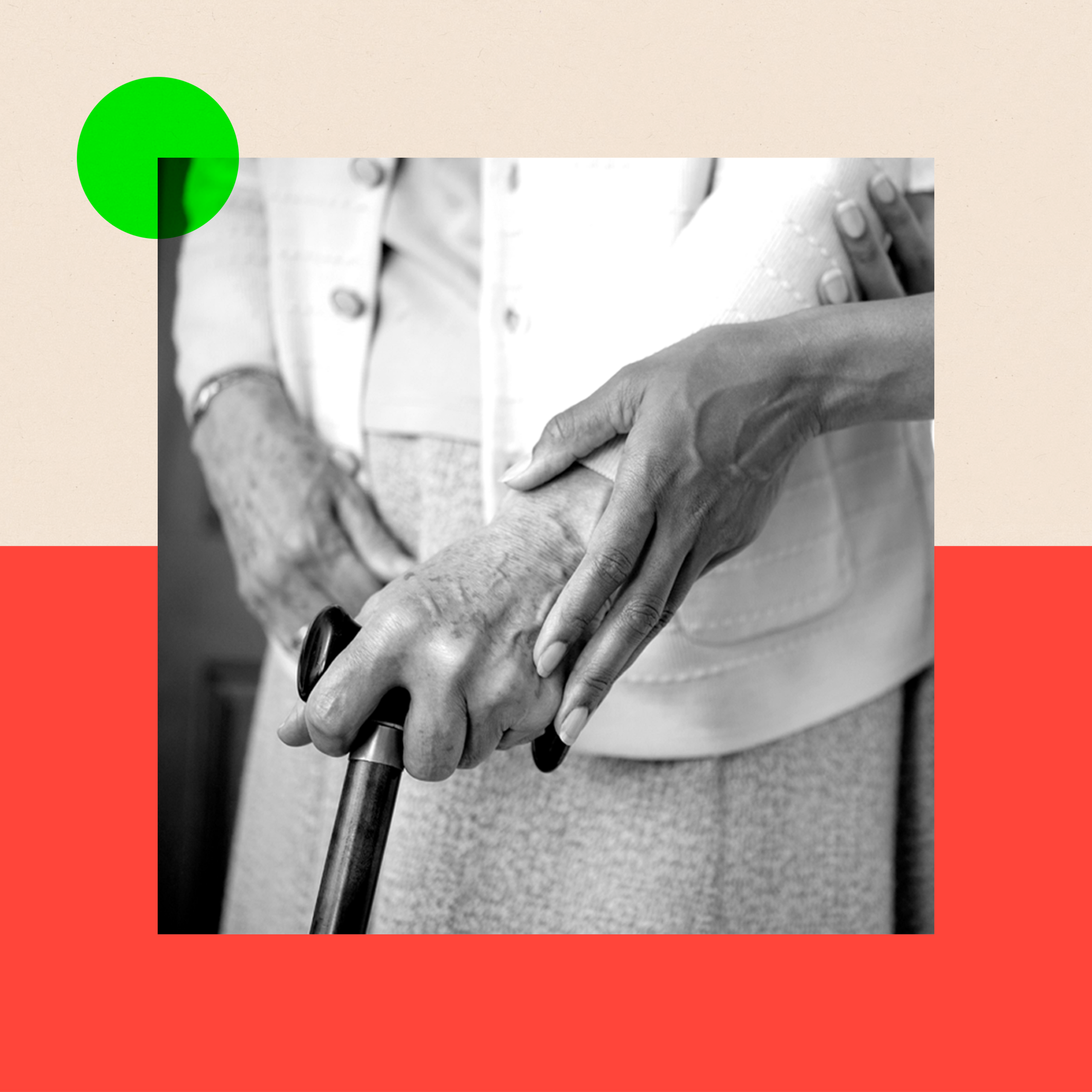 A black-and-white image of an elderly woman dressed in a long skirt and blazer, holding a walking stick, as a carer gently supports her by holding her hand.