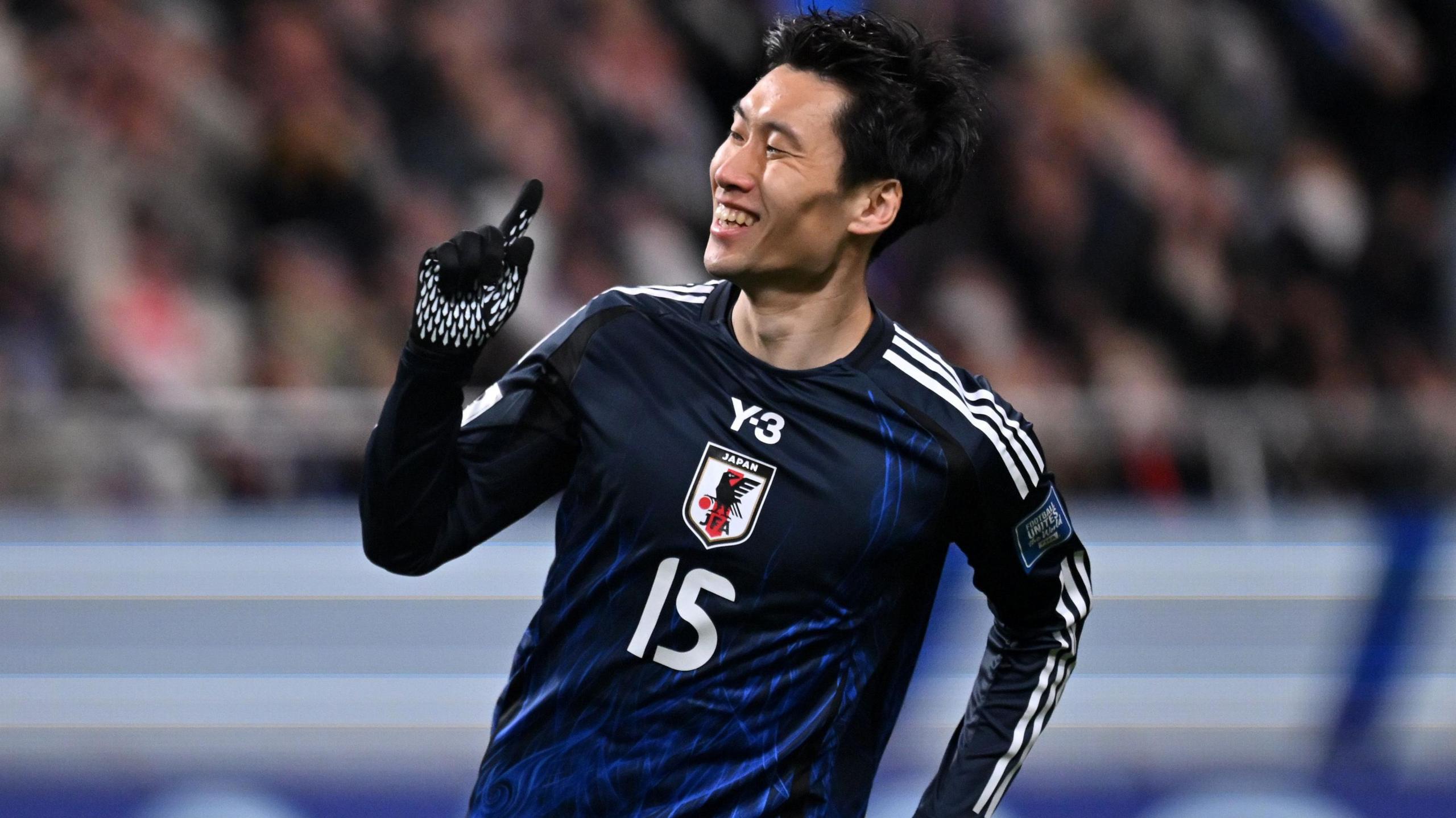 Daichi Kamada of Japan celebrates after scoring the team's first goal against Bahrain. 