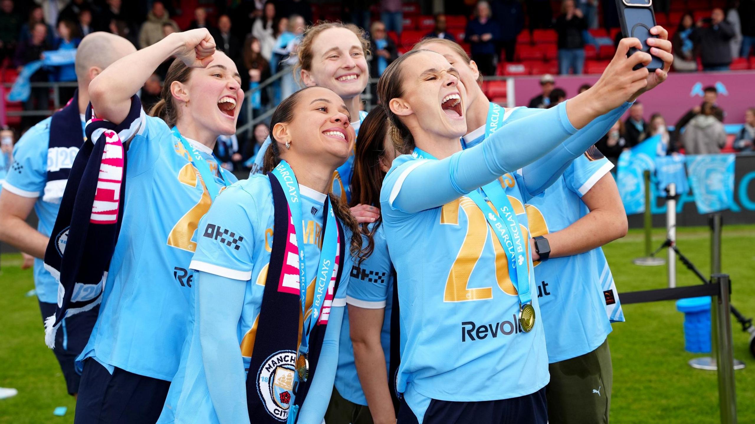 Manchester City's Kerstin Casparij (right) and team-mates take a selfie after winning the Barclays Women's Super League 