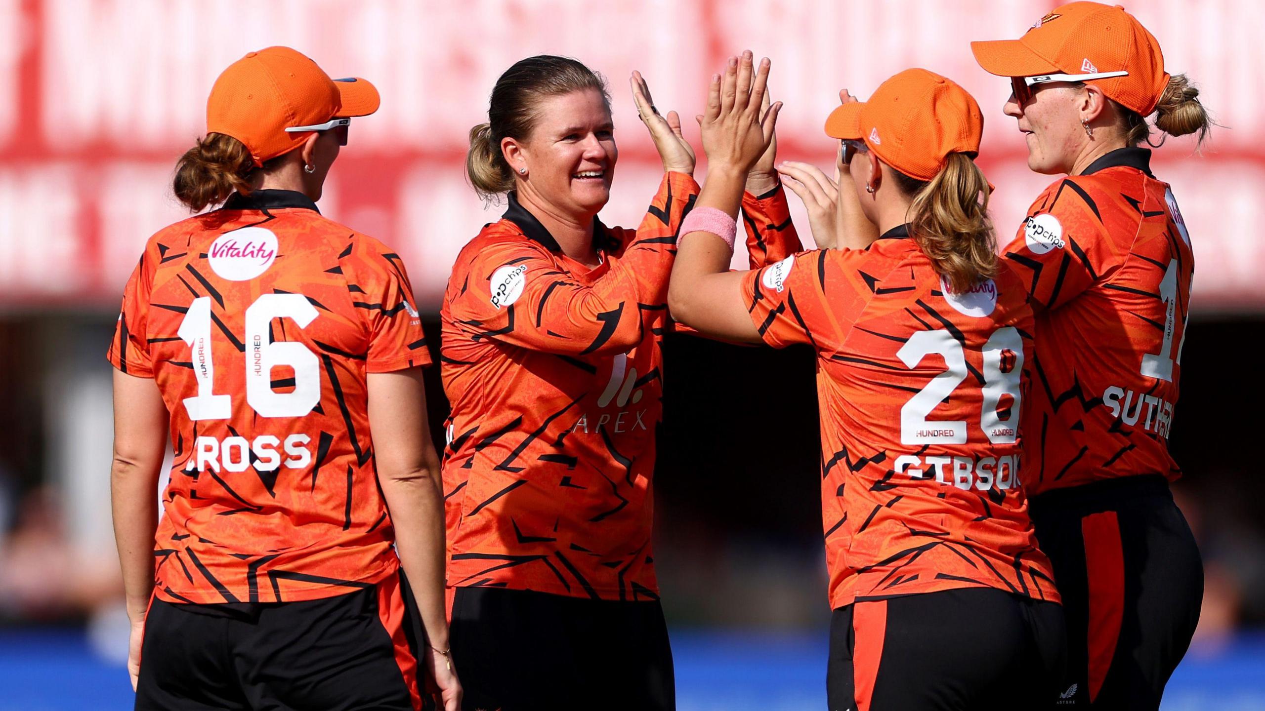 Jess Jonassen celebrates with her Sunrisers Leeds team-mates 