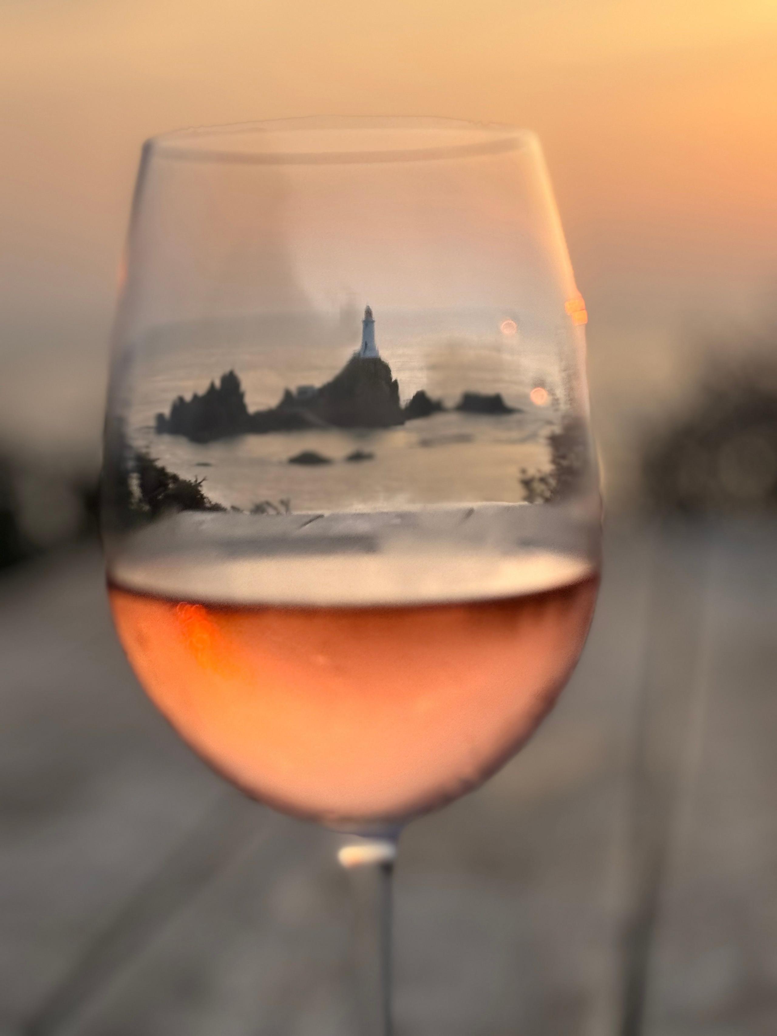 The landscape seen through a glass of wine