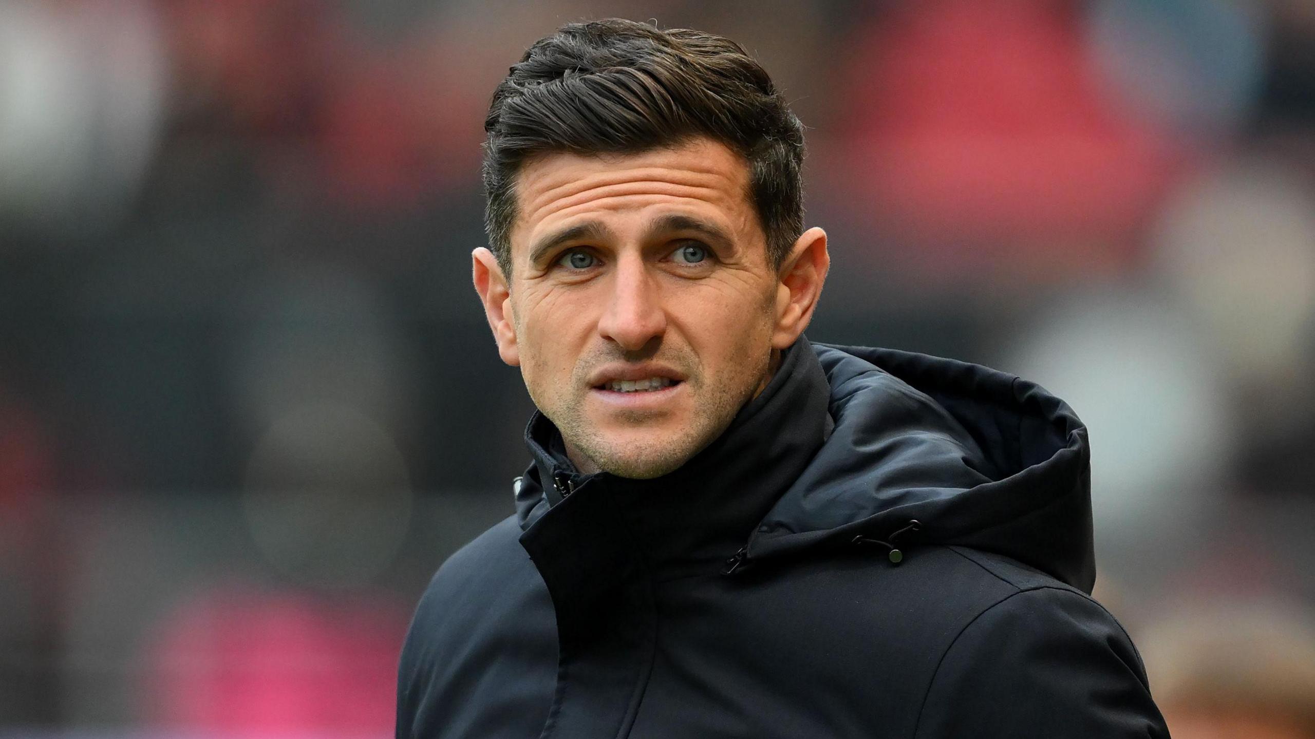 Portsmouth boss John Mousinho looks concerned during the 5-0 defeat at Bristol City