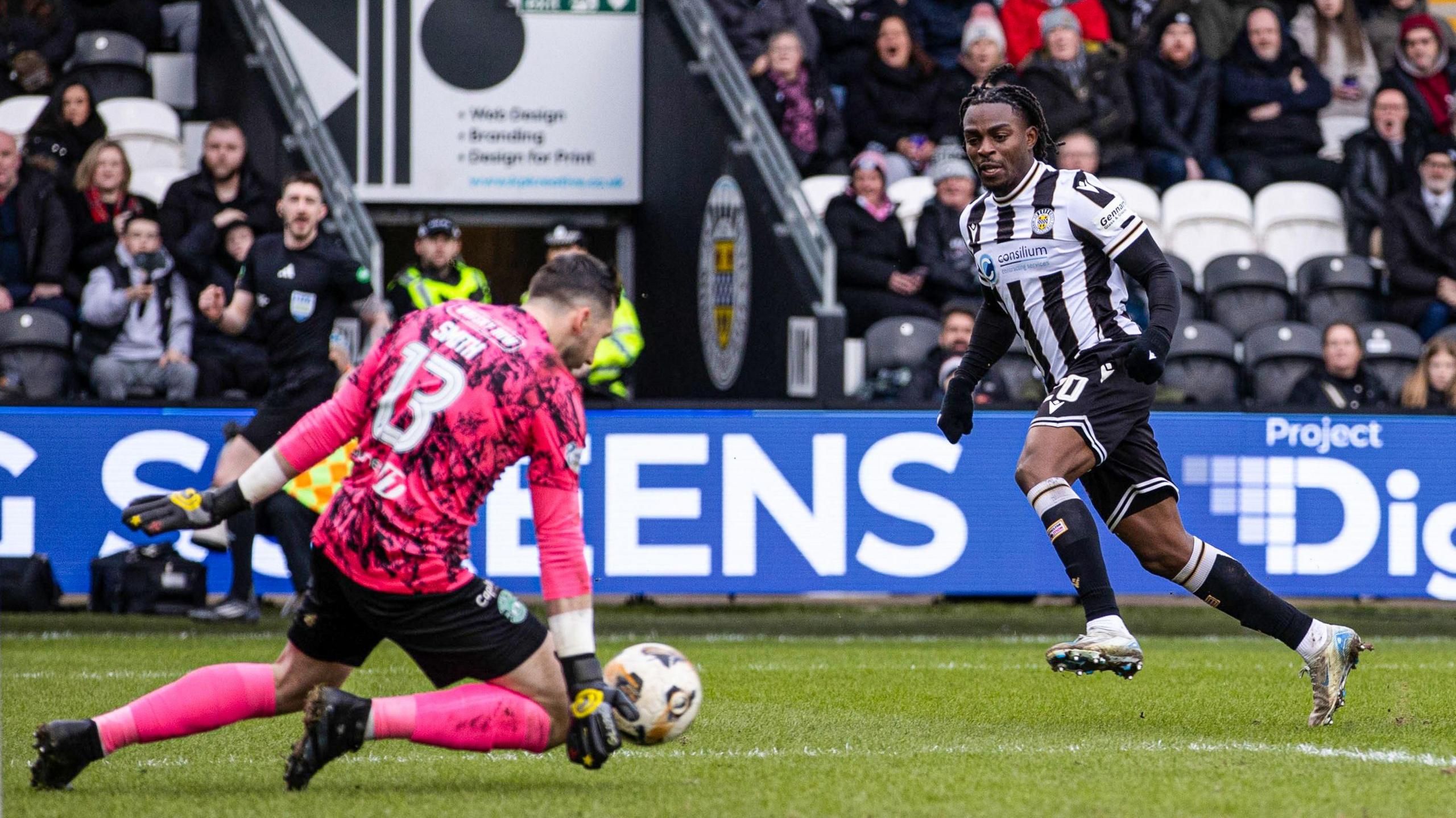 Toyosi Olusanya sees his shot saved by Jordan Smith