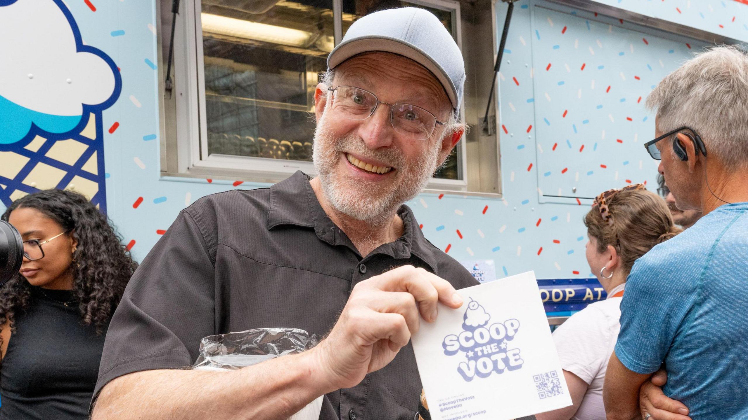 Jerry Greenfield, co-founder of Ben & Jerry’s, partnered with MoveOn to hand out free ice cream at Franklin Square in Philadelphia during their Scoop The Vote tour to get-out-the-vote for Vice President Kamala Harris and Democrats down the ballot. on September 16, 2024 in Philadelphia, Pennsylvania.