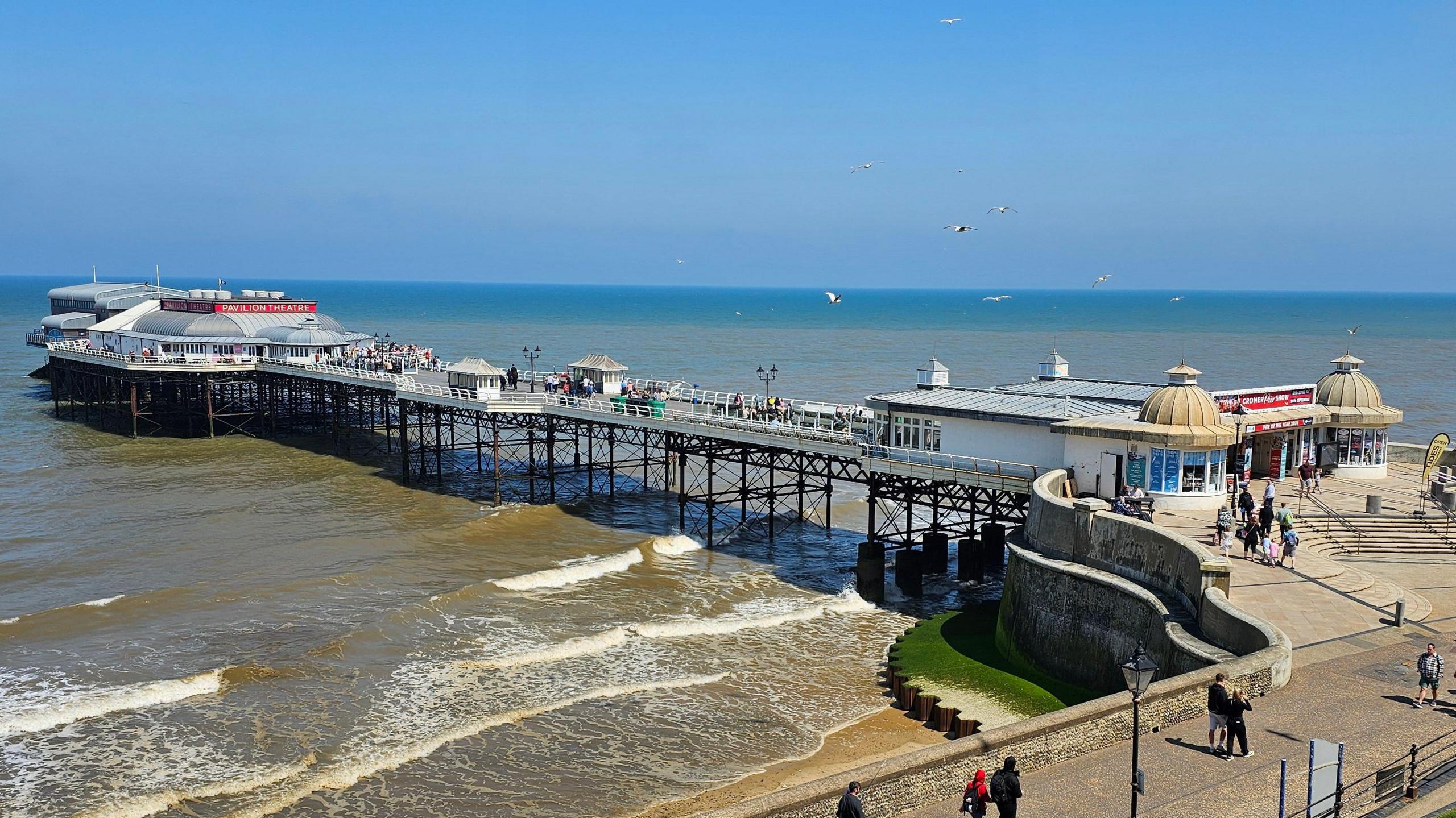 Cromer Pier, as seen from the an elevated position above the promenade.