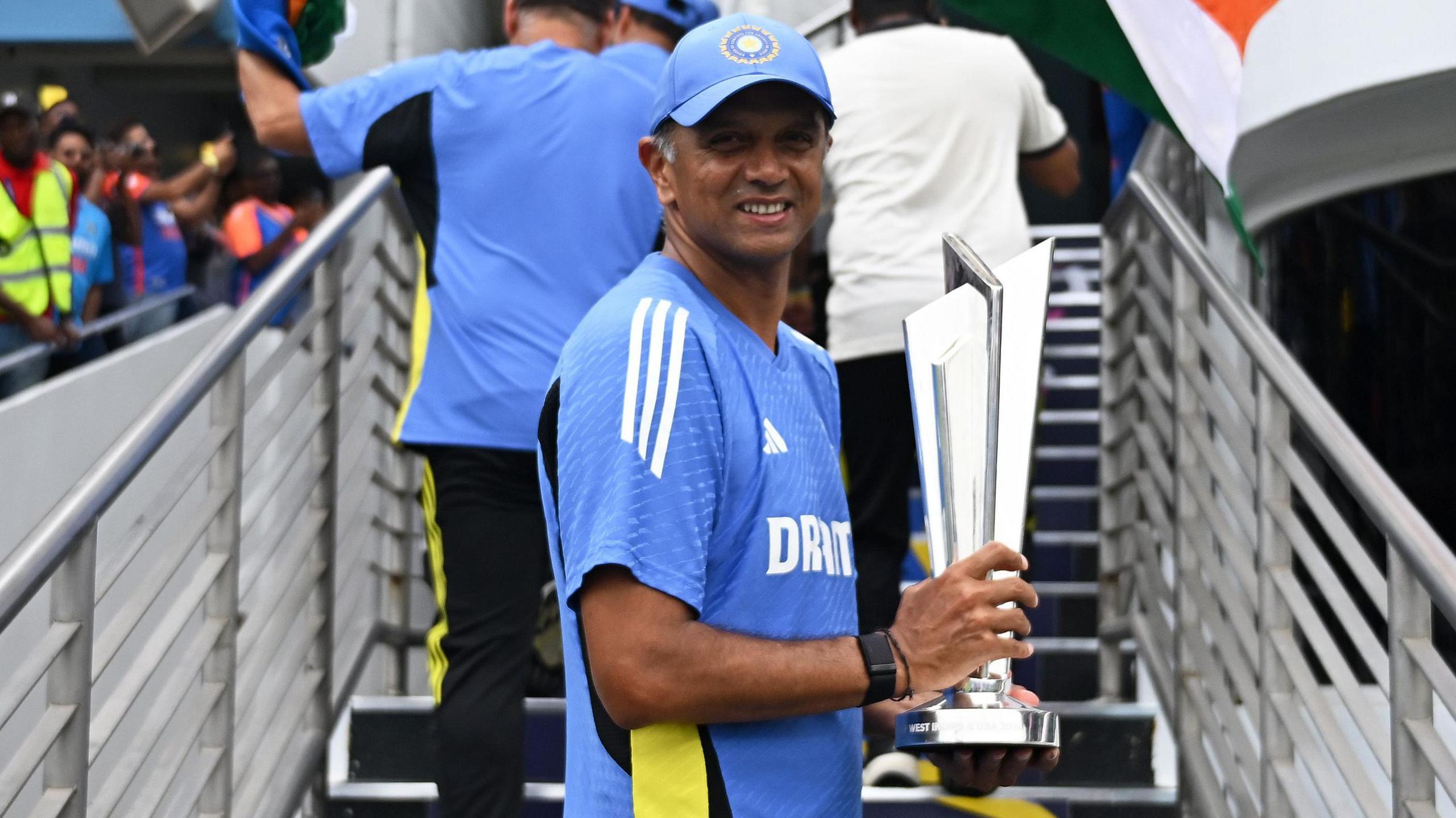 Rahul Dravid holding the T20 World Cup trophy after guiding India to victory at the tournament in 2024