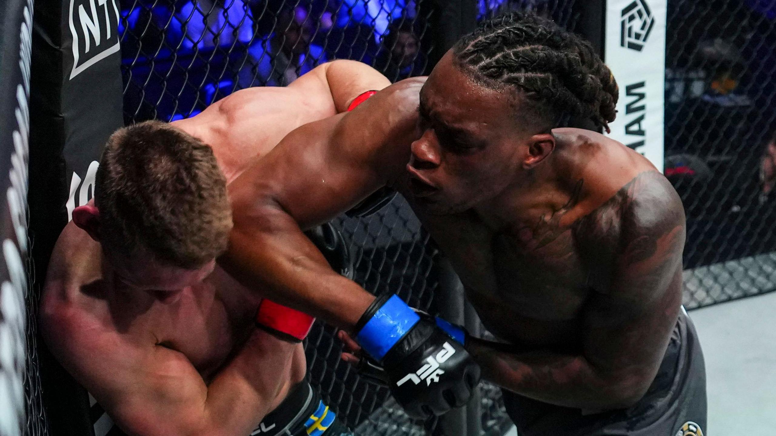 Simeon Powell elbows Karl Albrektsson during their PFL light-heavyweight contest