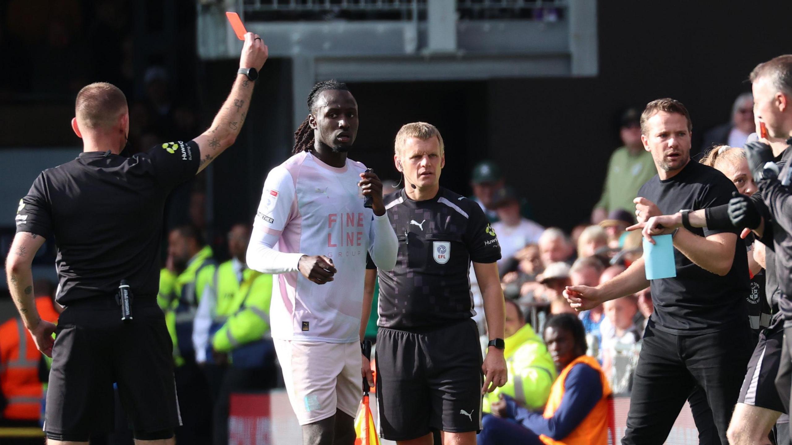 Plymouth Argyle head coach Tom Cleverley is sent to the stands halfway through the second half
