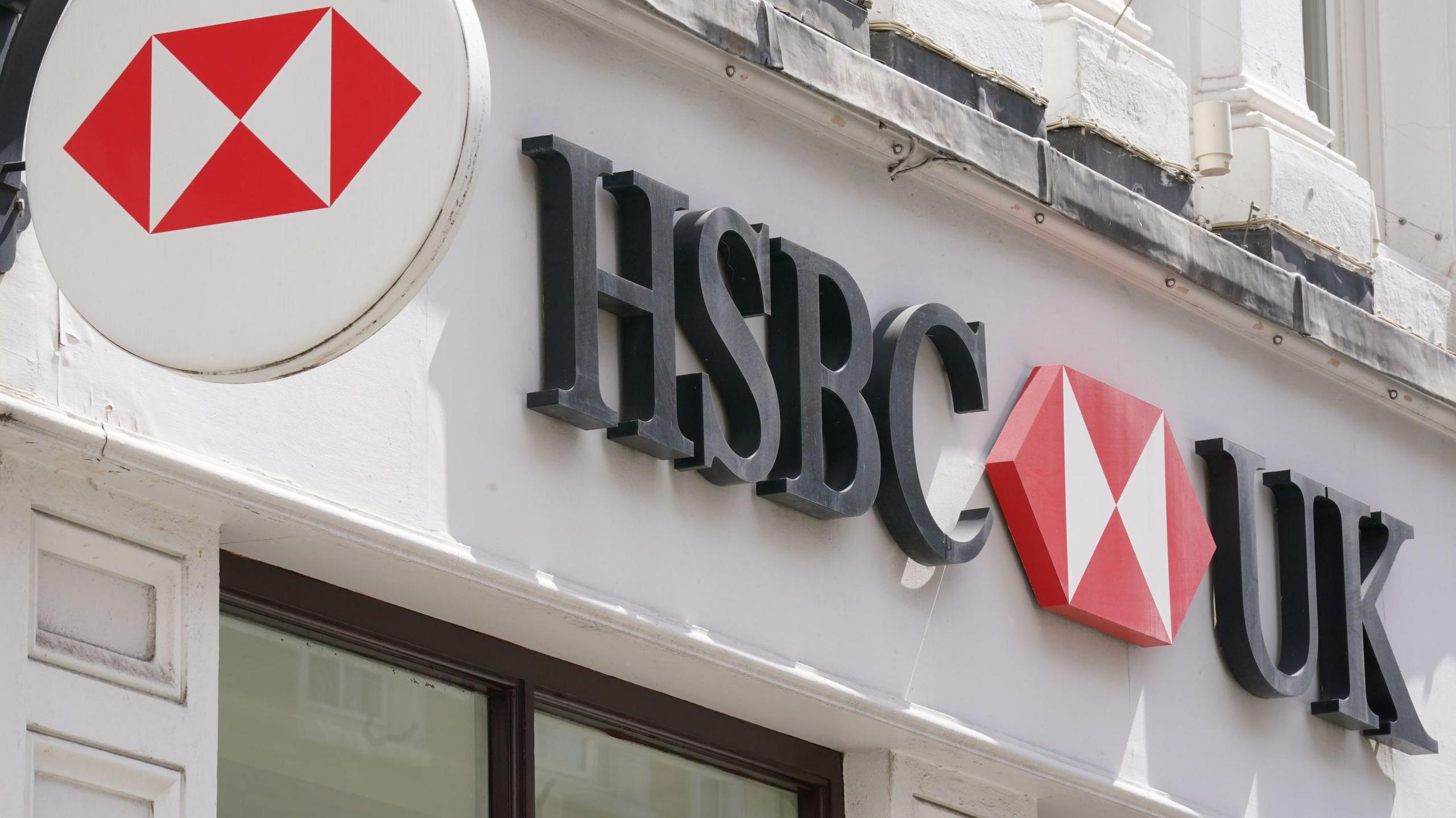 Sign on the front of a building which reads 'HSBC UK'