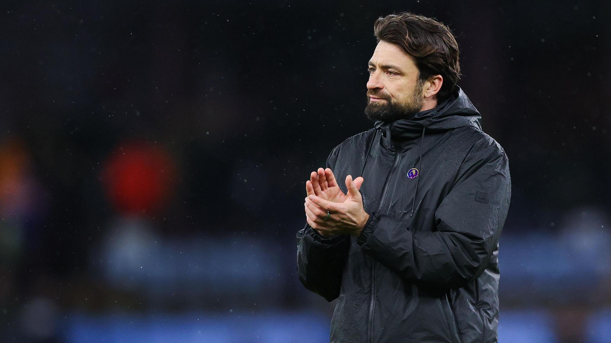 Russell Martin, manager of Southampton, applauds the visiting supporters after the Premier League match between Aston Villa FC and Southampton FC at Villa Park