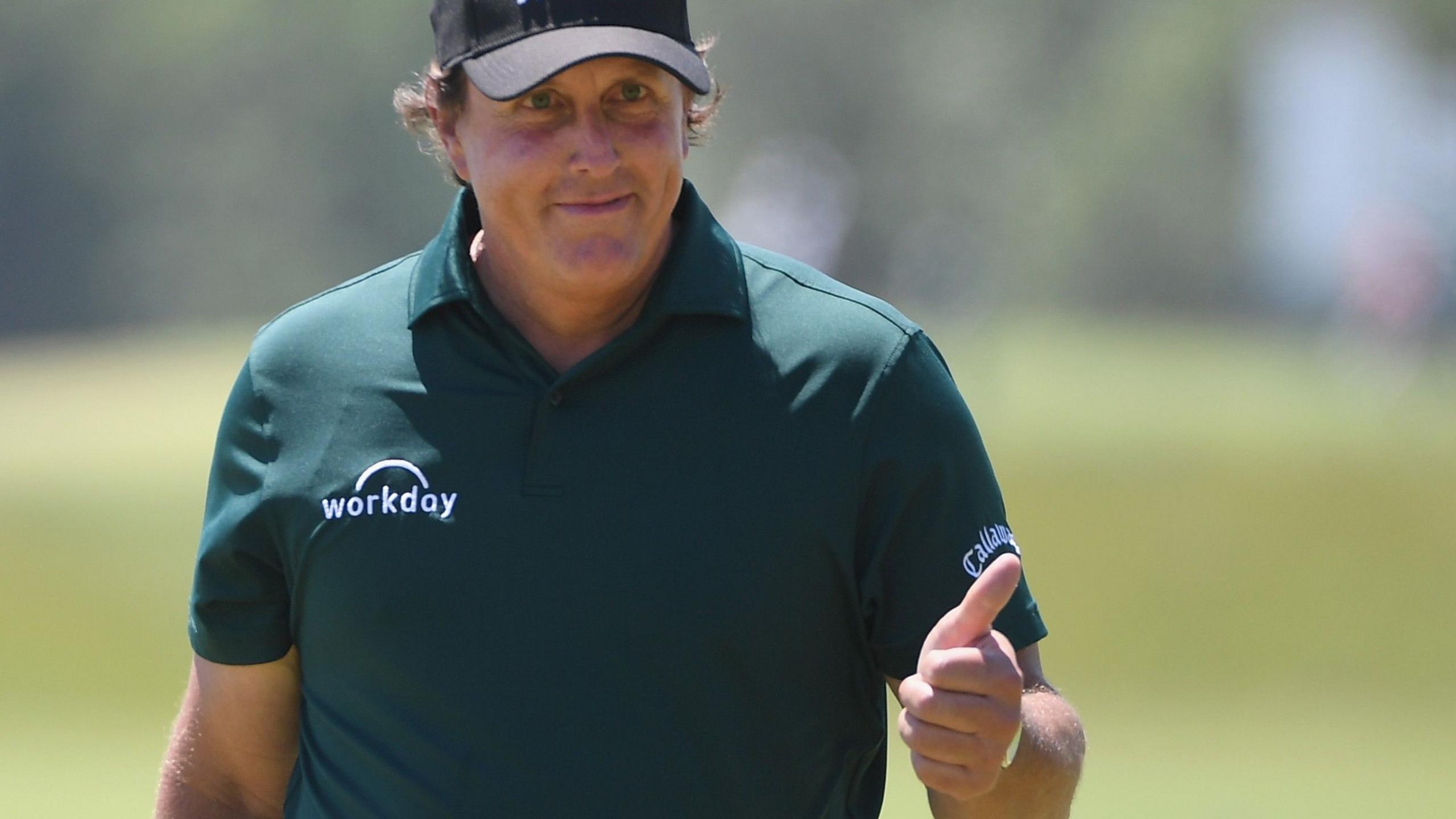 Phil Mickelson gives a thumbs up to the fans during round three of the 2018 US Open 