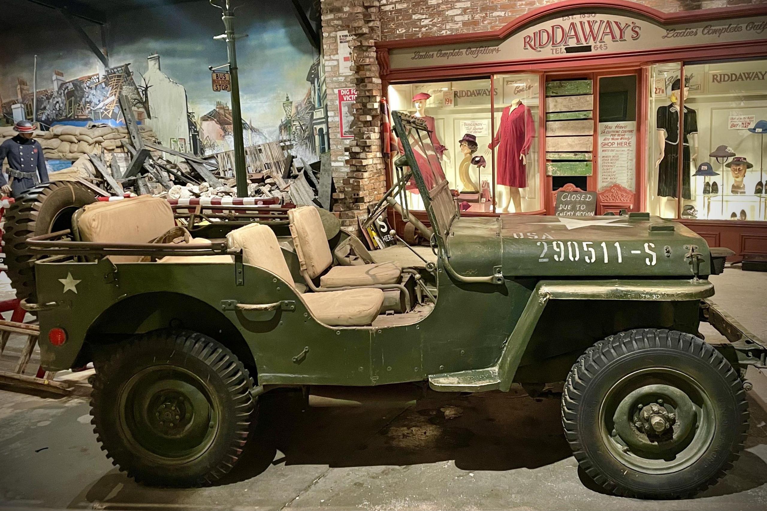 World War 2 American jeep parked in a mocked up representation of Britain during the blitz of 1940-1941