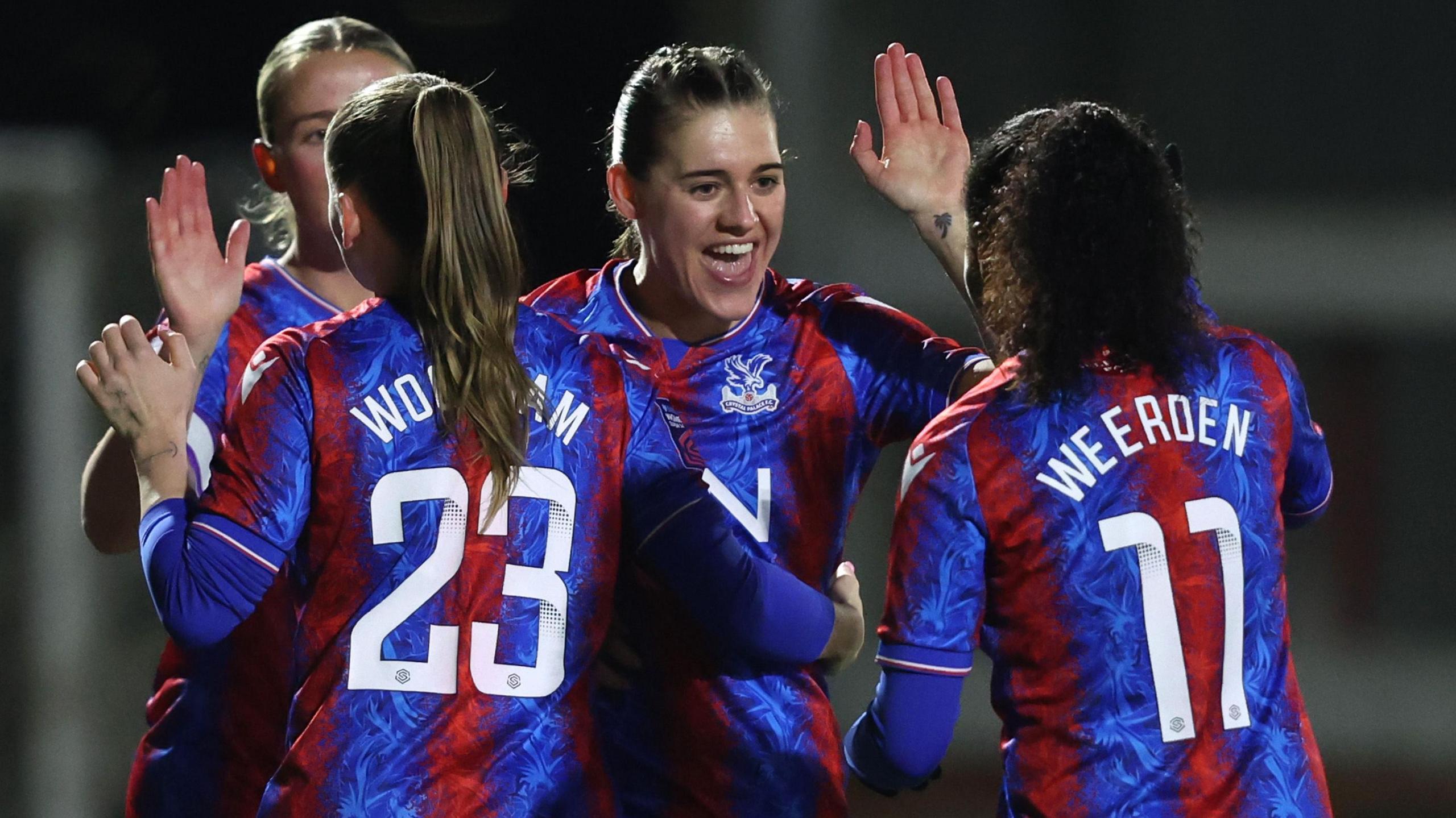 Molly-Mae Sharpe of Crystal Palace celebrates scoring her team's first goal with team-mates Lily Woodham and Ashleigh Weerden during The Adobe Women's FA Cup Fourth Round match between Crystal Palace and Sheffield United