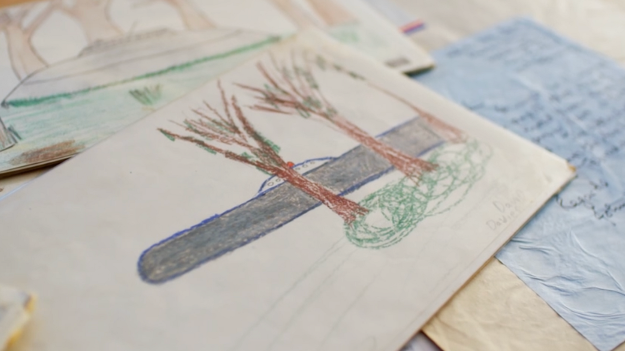 Broad Haven Primary School children's drawings of UFOs on a table 