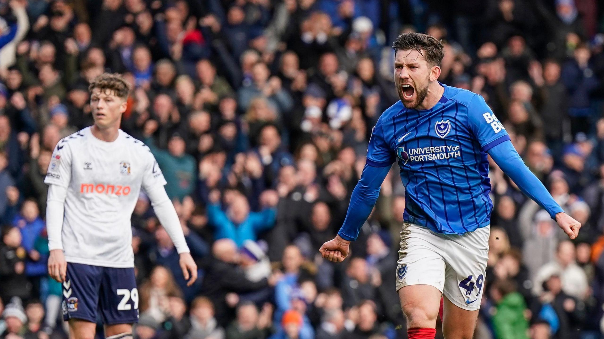 Portsmouth's Callum Lang celebrates one of his four goals against Coventry