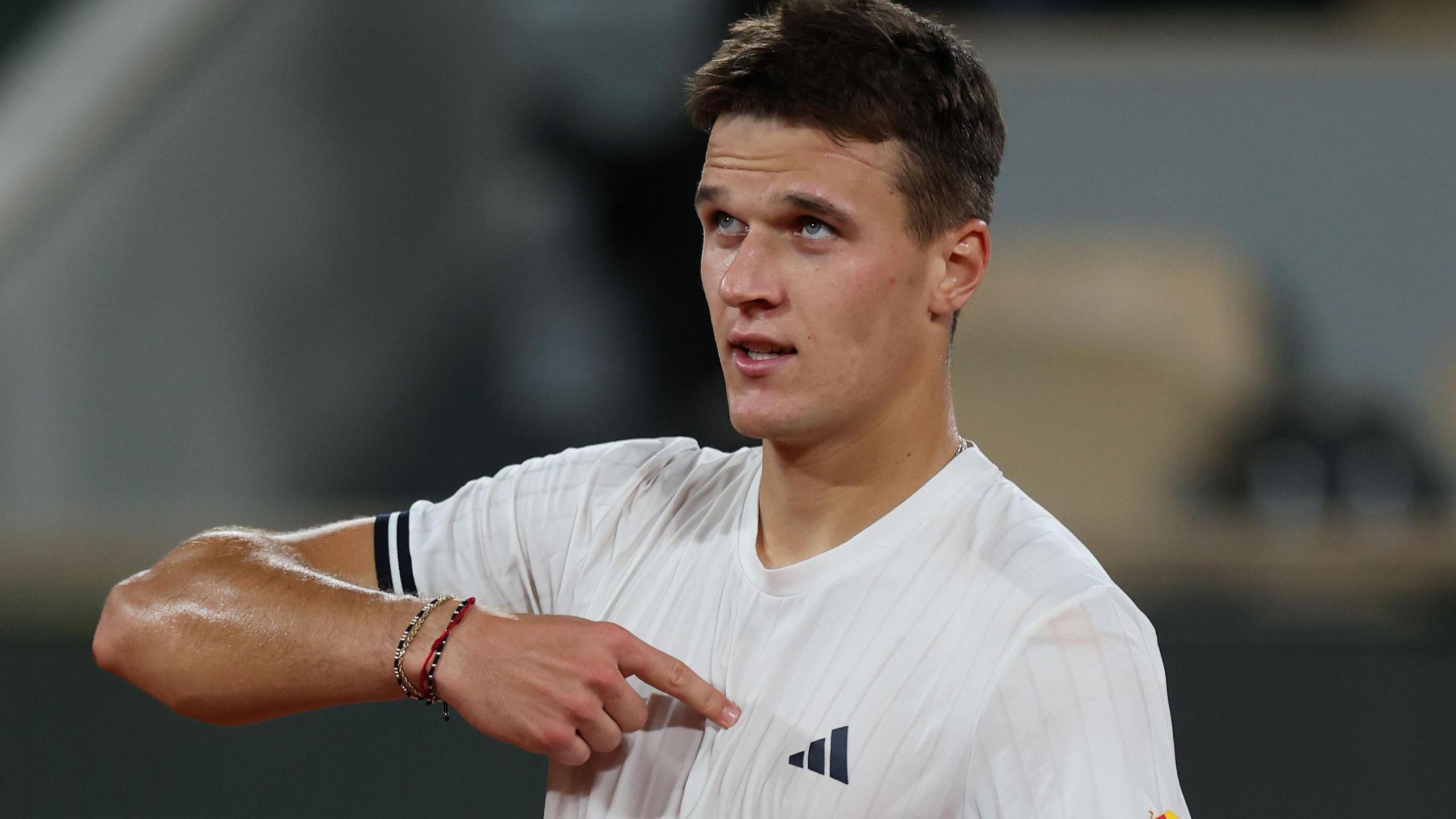 Jakub Mensik points to his heart after beating Joao Fonseca in the 2026 French Open quarter-finals