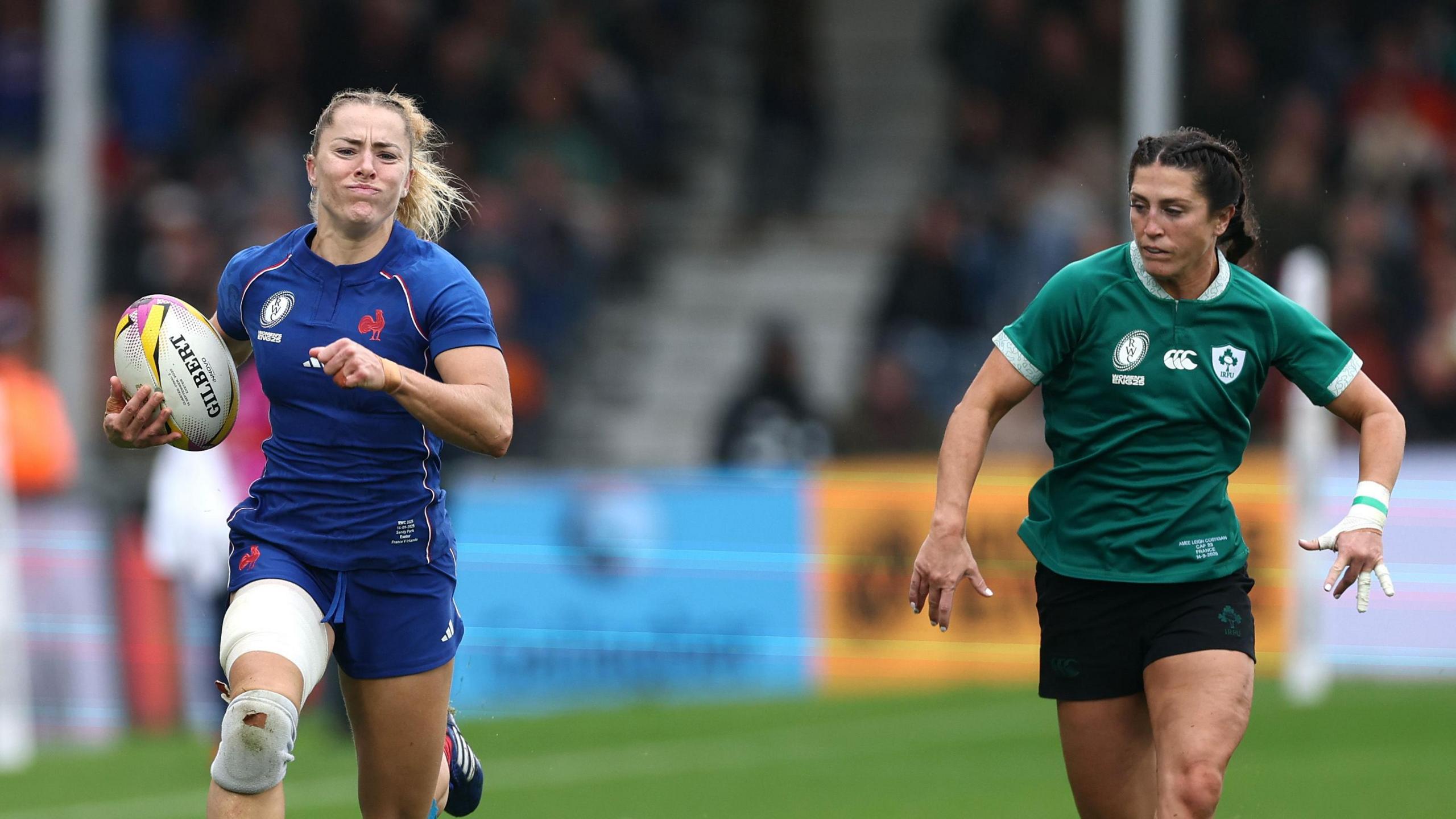 Joanna Grisez runs clear of Amee-Leigh Costigan