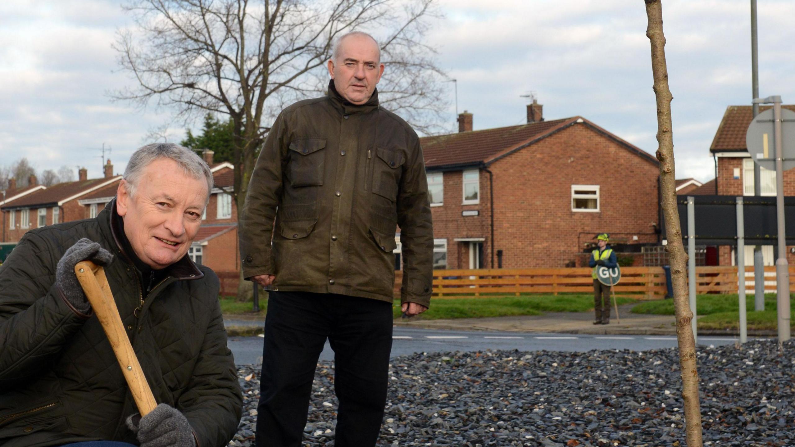 Ernest Gibson and Ken Dawes planting the cherry tree