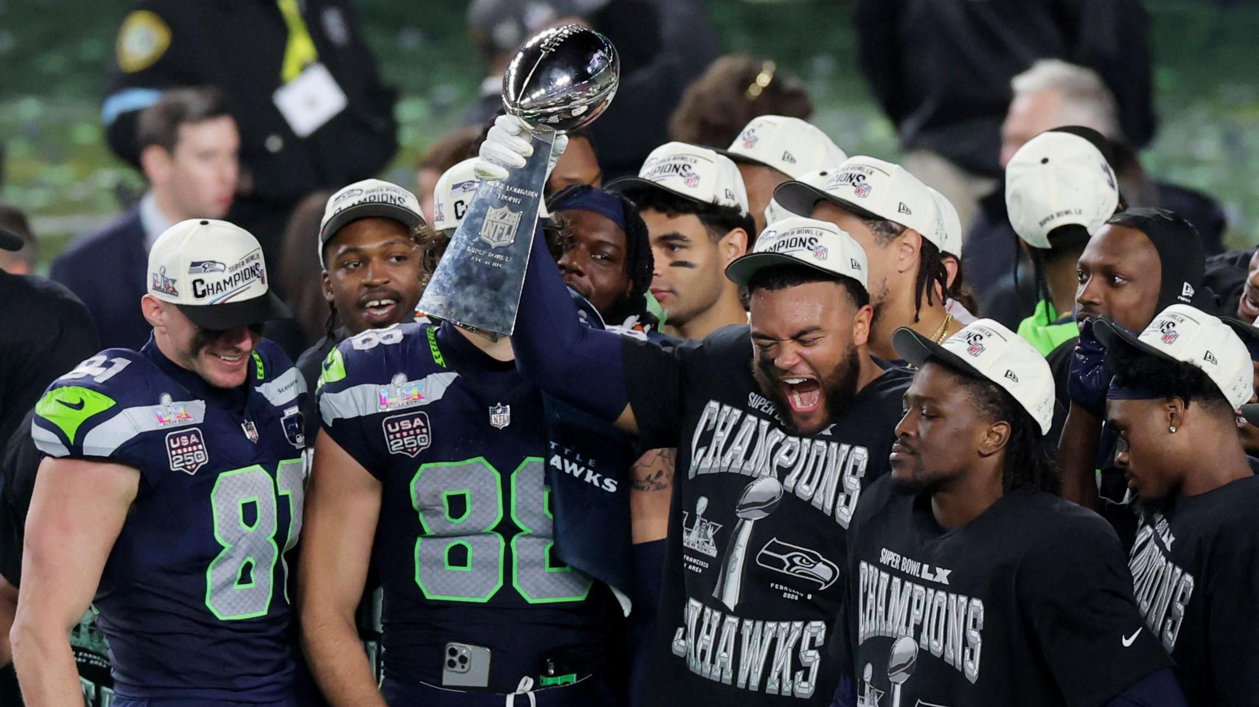 The Seattle Seahawks lift the trophy.