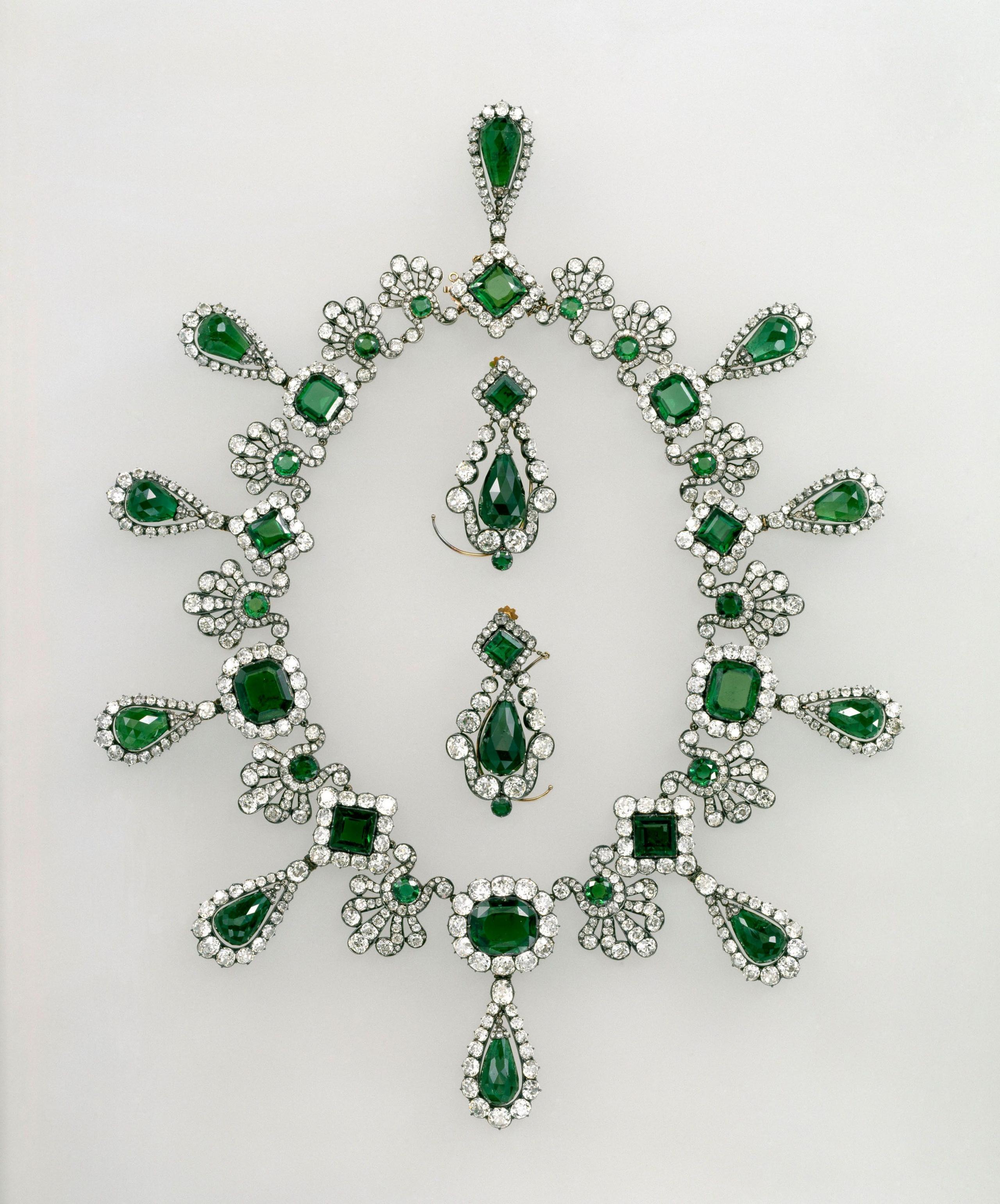 A silver necklace with green jewels stolen during the Louvre heist