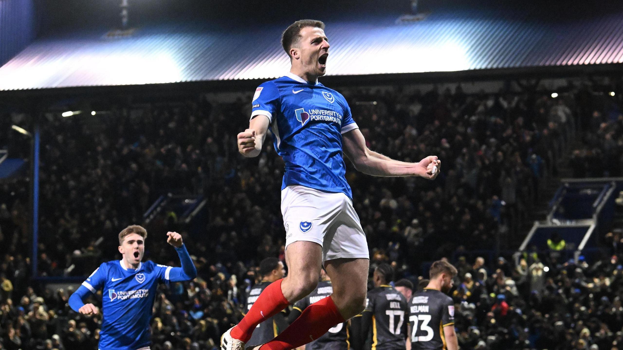 Conor Shaughnessy of Portsmouth celebrates scoring at Fratton Park