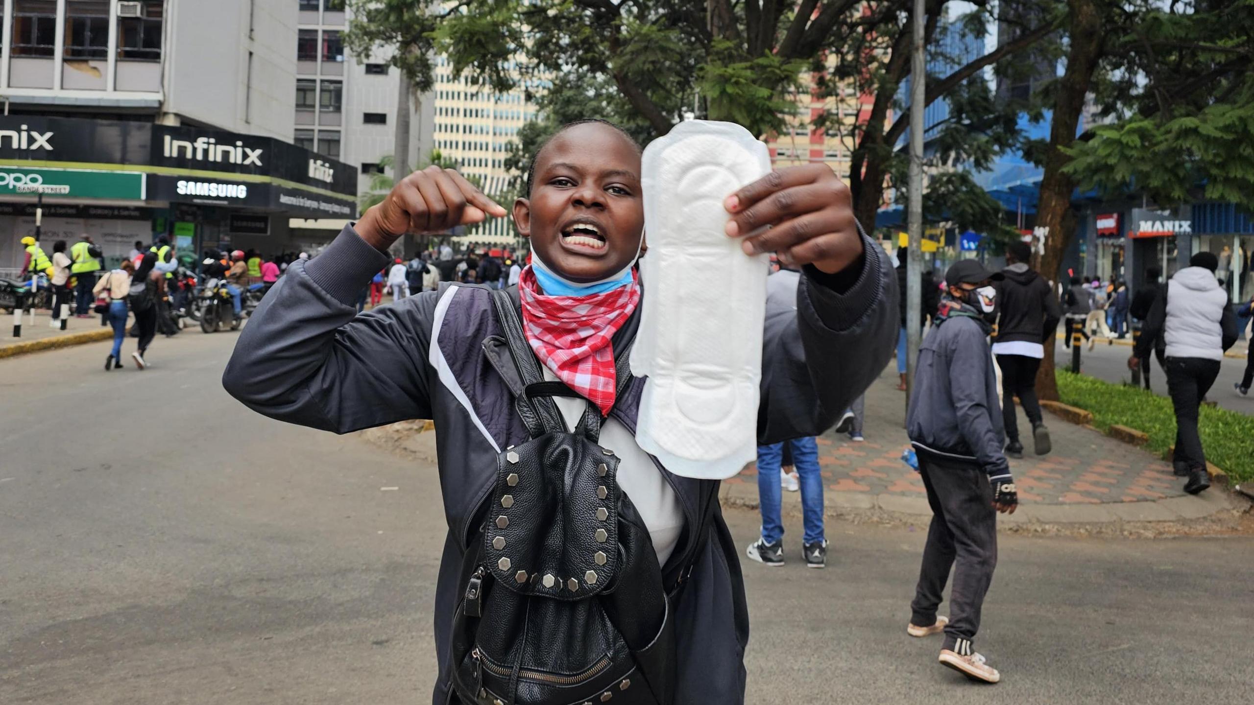 26-year-old Aristaricus Irolo, holding a sanitary pad