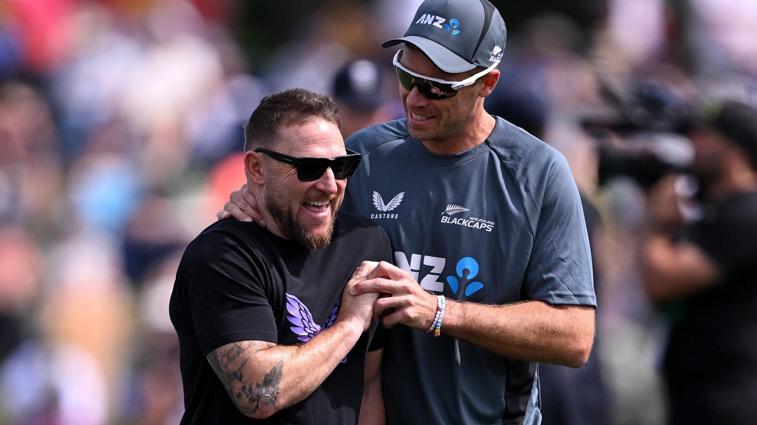 Tim Southee and Brendon McCullum share a joke