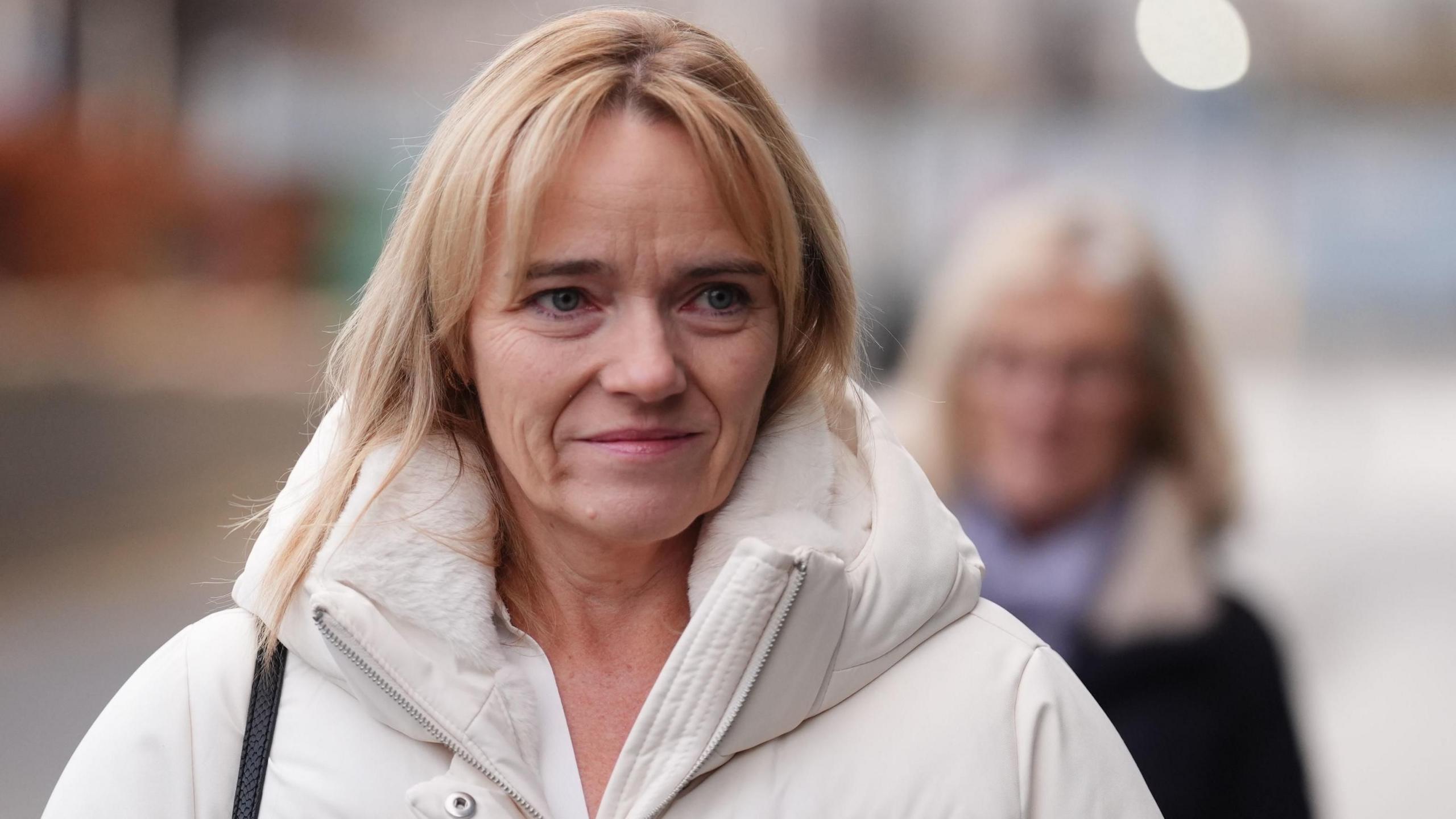 Nurse Sandie Peggie wearing a white winter jacket. She has blonde hair.