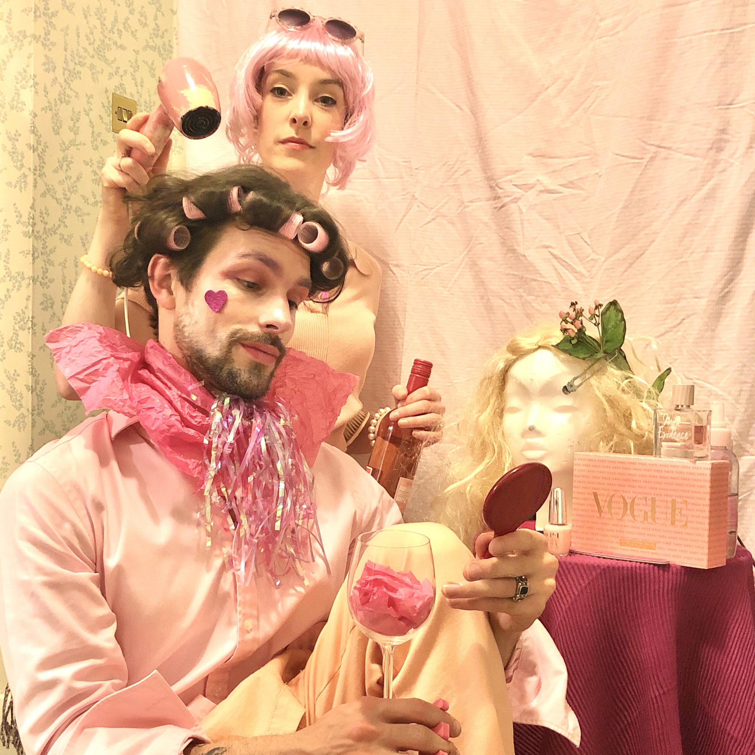 Helen Yang and Thomas Etheridge in pink outfits