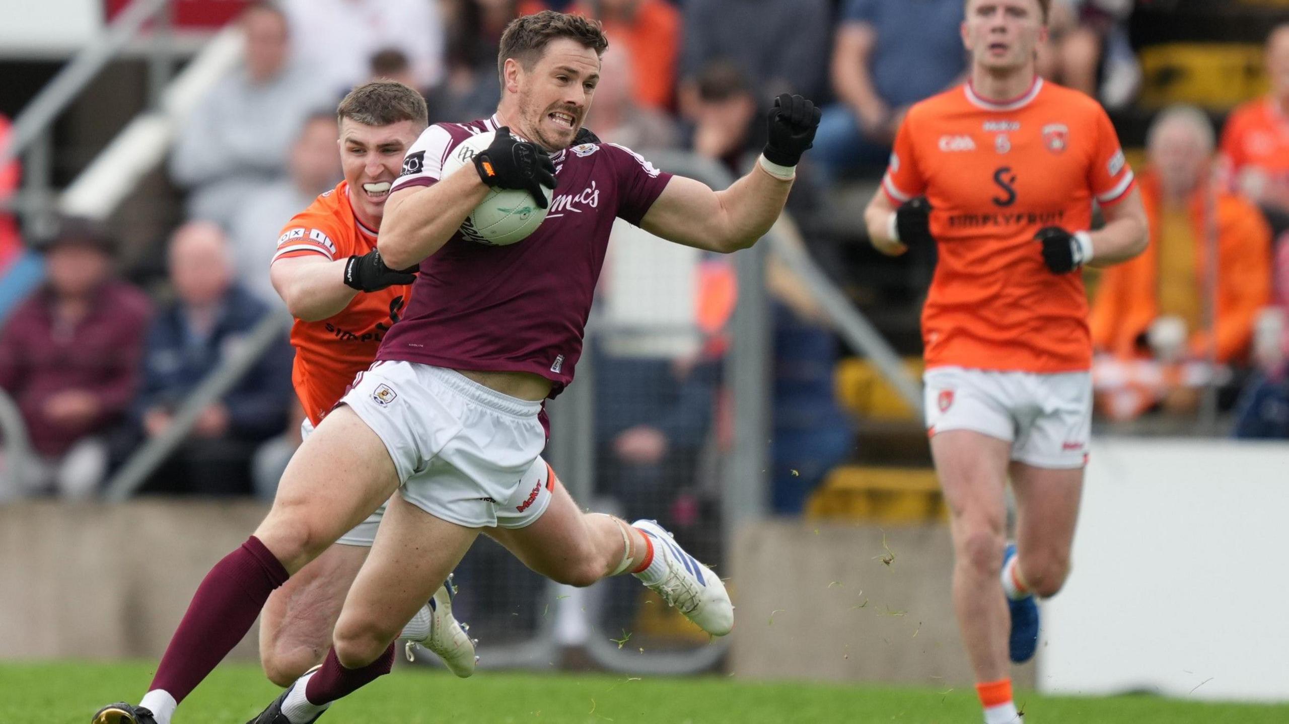 Galway's Shane Walsh breaks a tackle