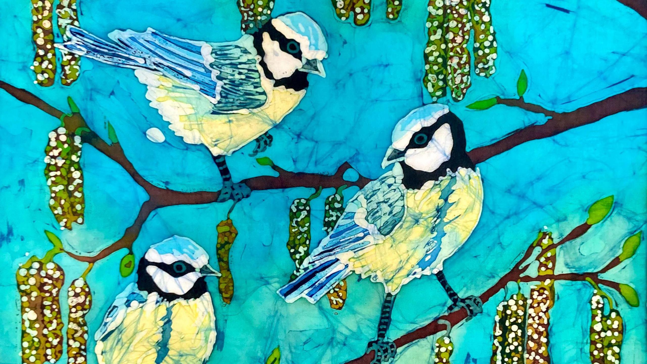 Trio of blue tits in Batik