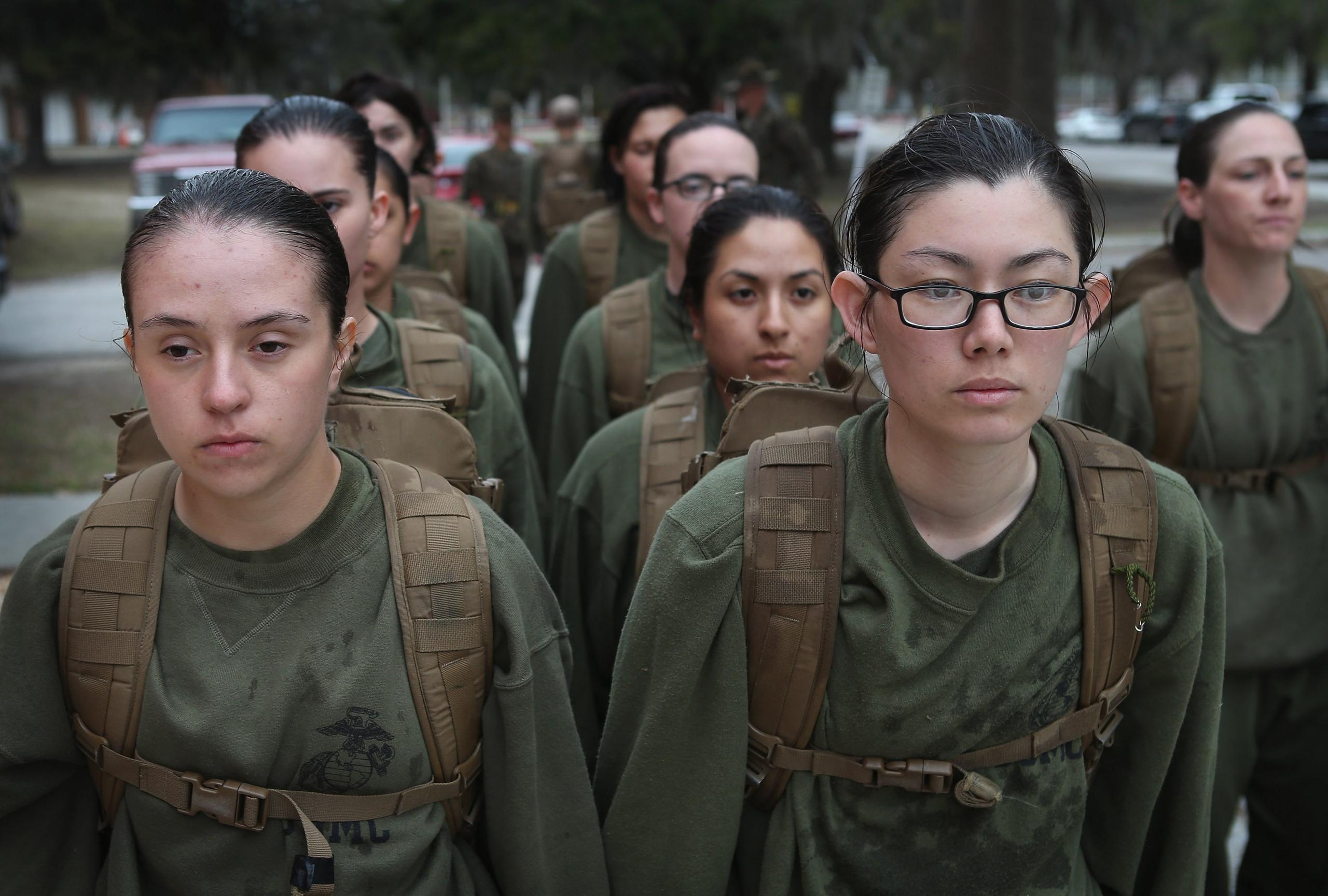 Female Marine recruits stand in formation during boot camp on 25 February, 2013 at MCRD Parris Island, South Carolina.