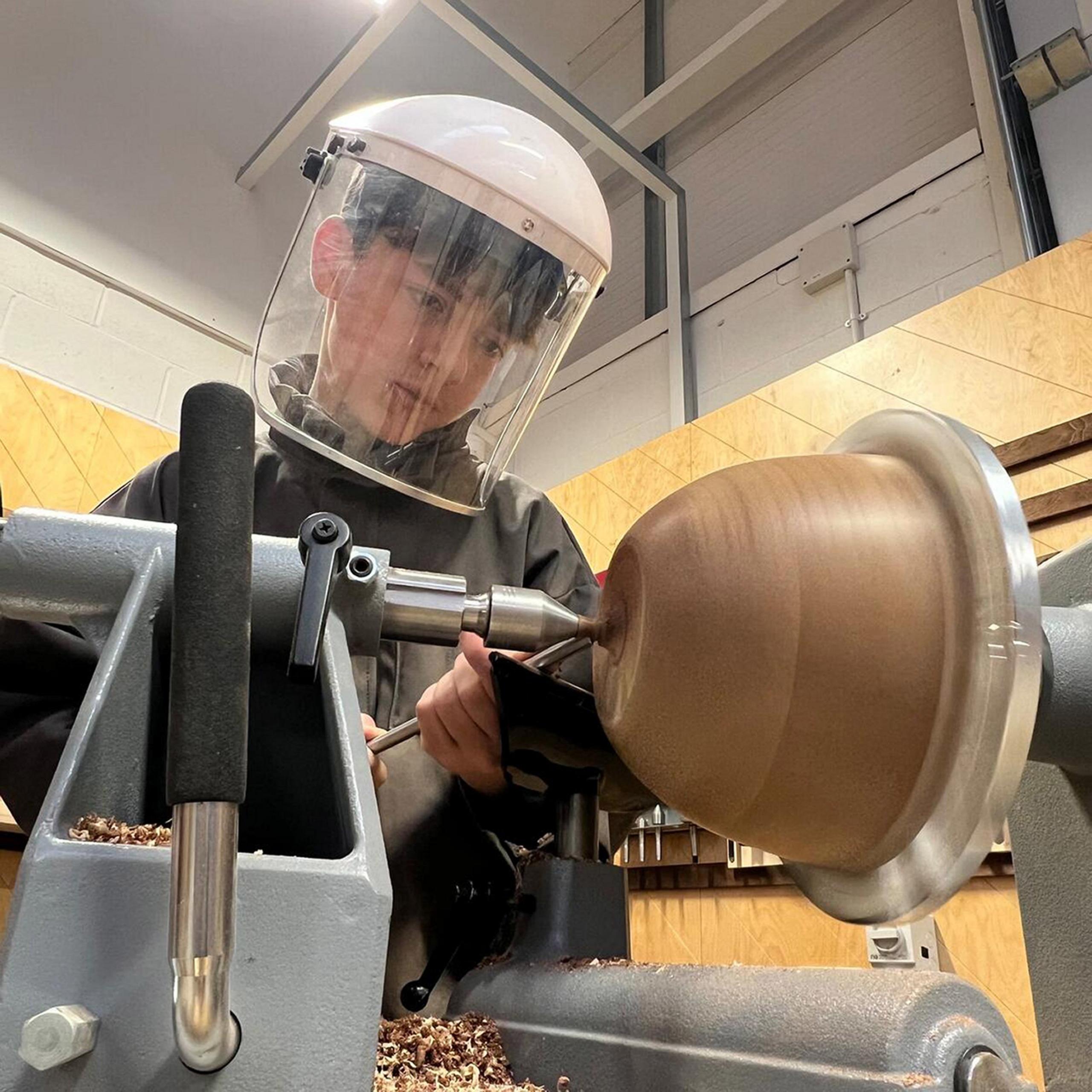 boy-doing-woodwork.