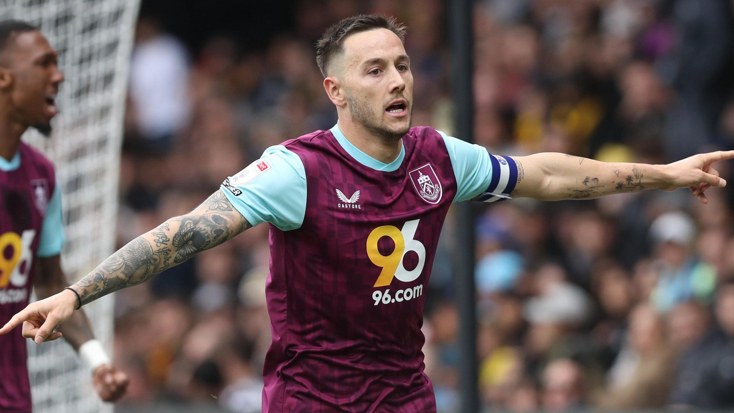 Captain Josh Brownhill celebrates after putting Burnley 2-1 up at Watford