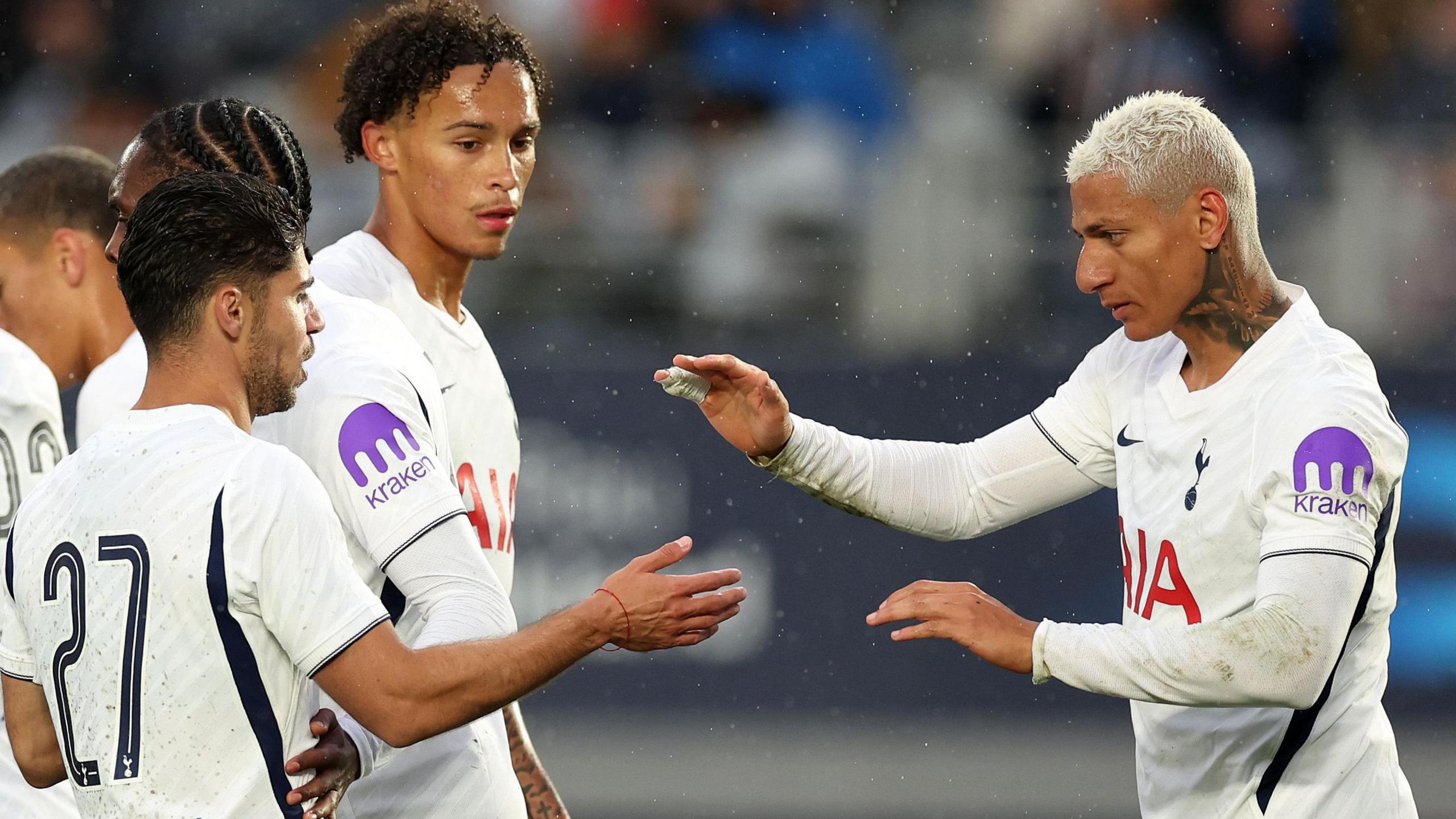 Tottenham's Richarlison celebrates his goal against Auckland FC with his team-mates 