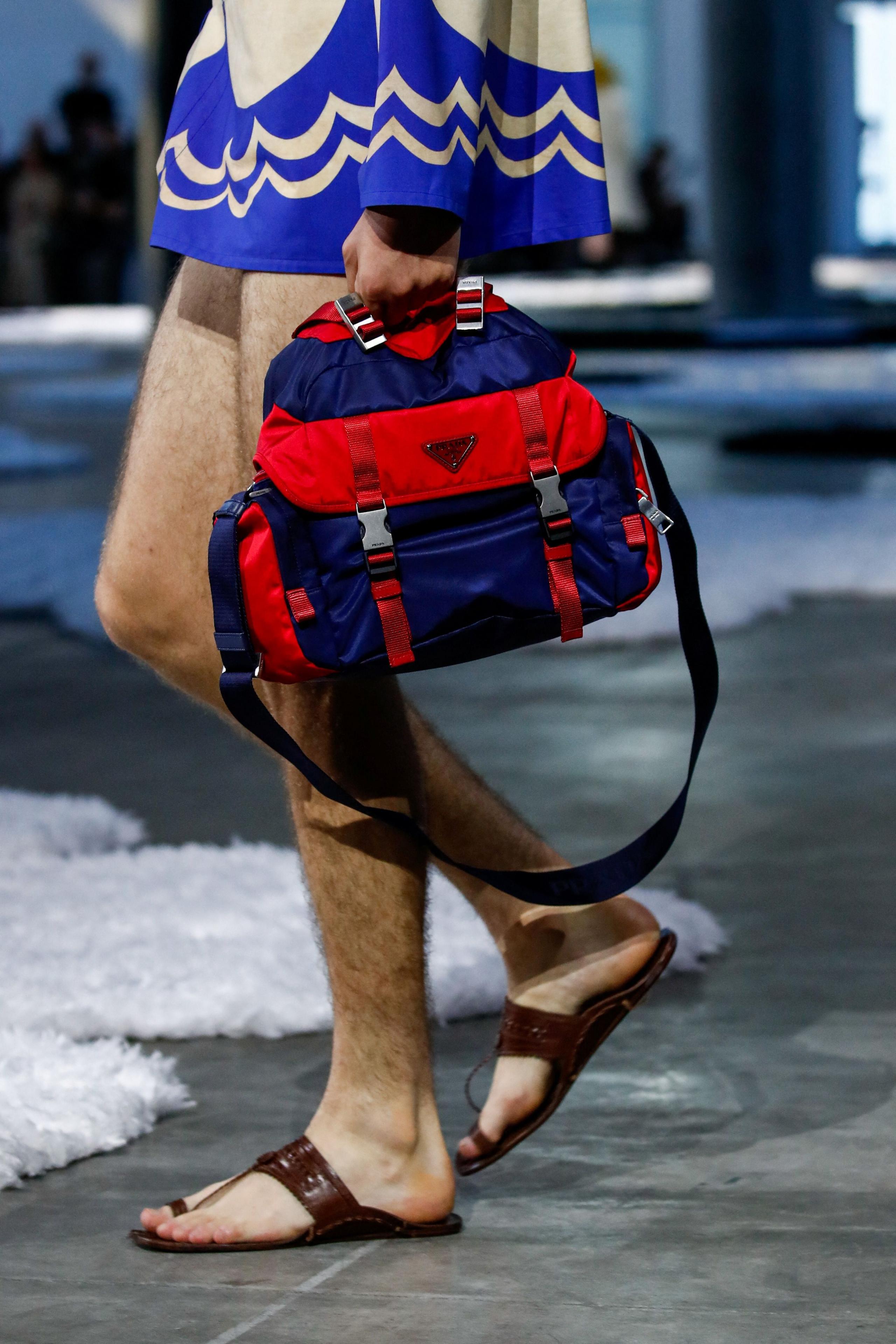A model presents a creation from Prada Spring-Summer 2026 menswear collection during the Milan Fashion Week in Milan, Italy, June 22, 2025.