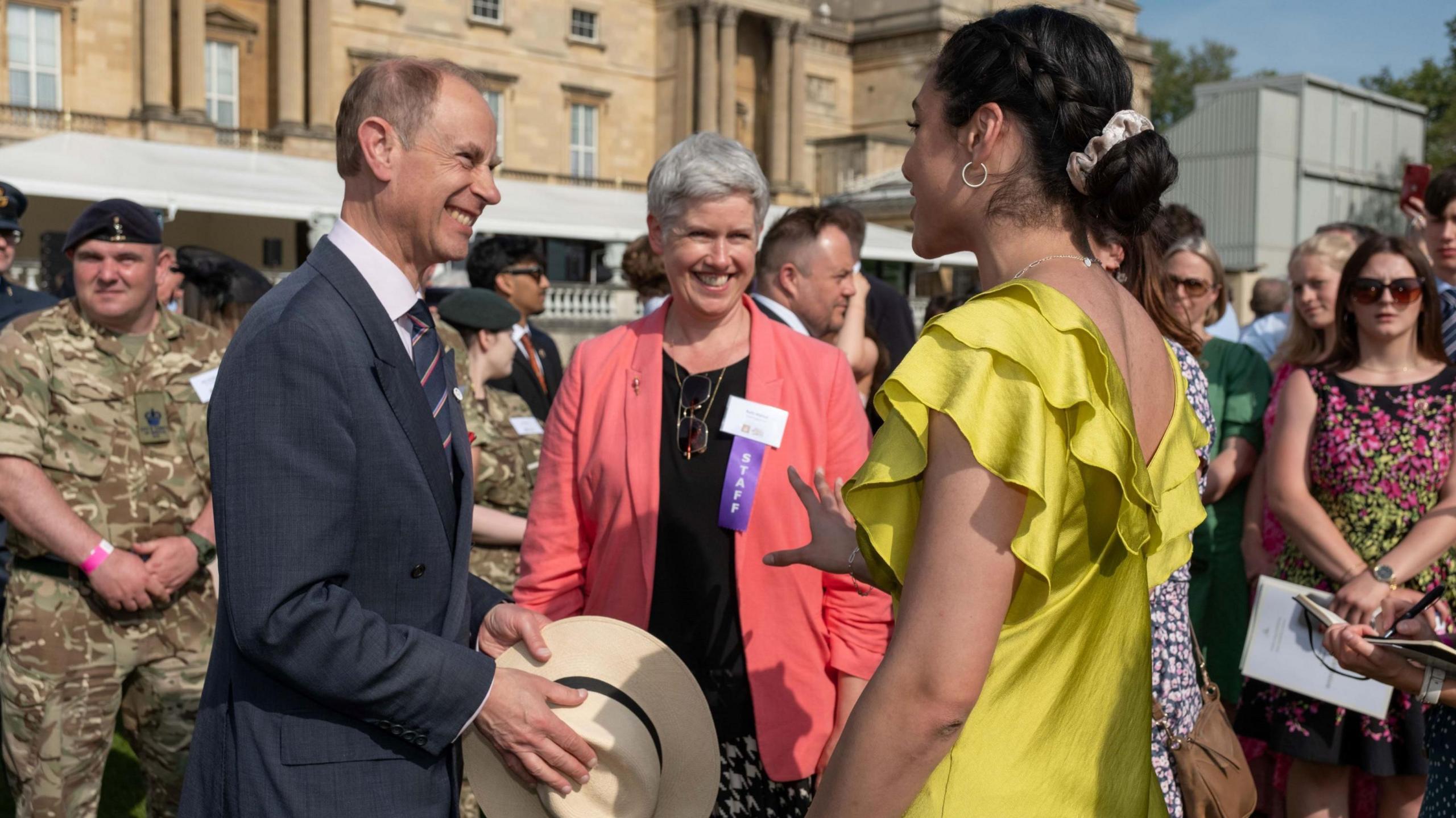 Image of Lauren Bennett talking to the Duke of Edinburgh, Prince Edward, and Ruth Marvel