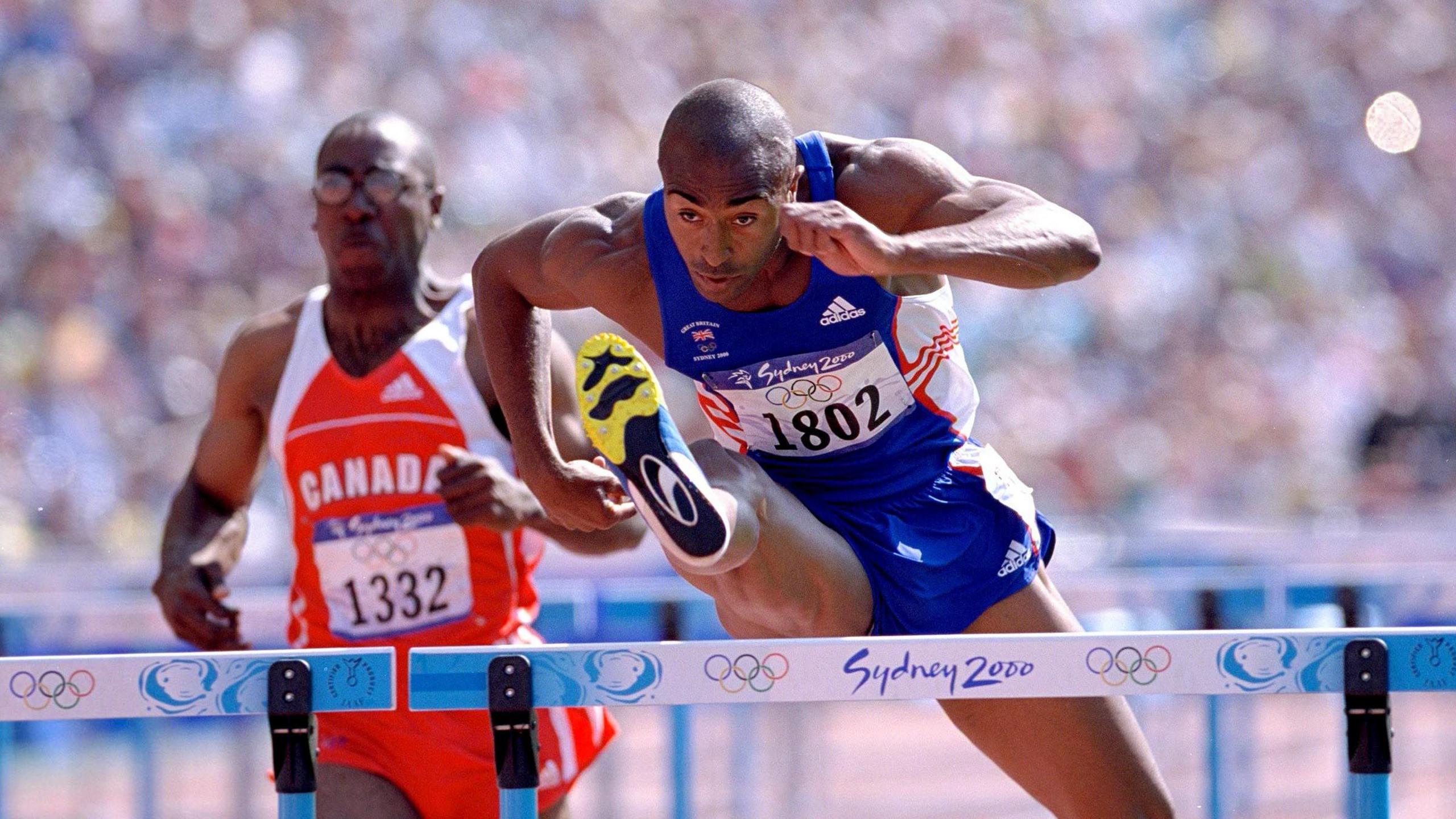 Colin Jackson hurdles at Sydney 2000