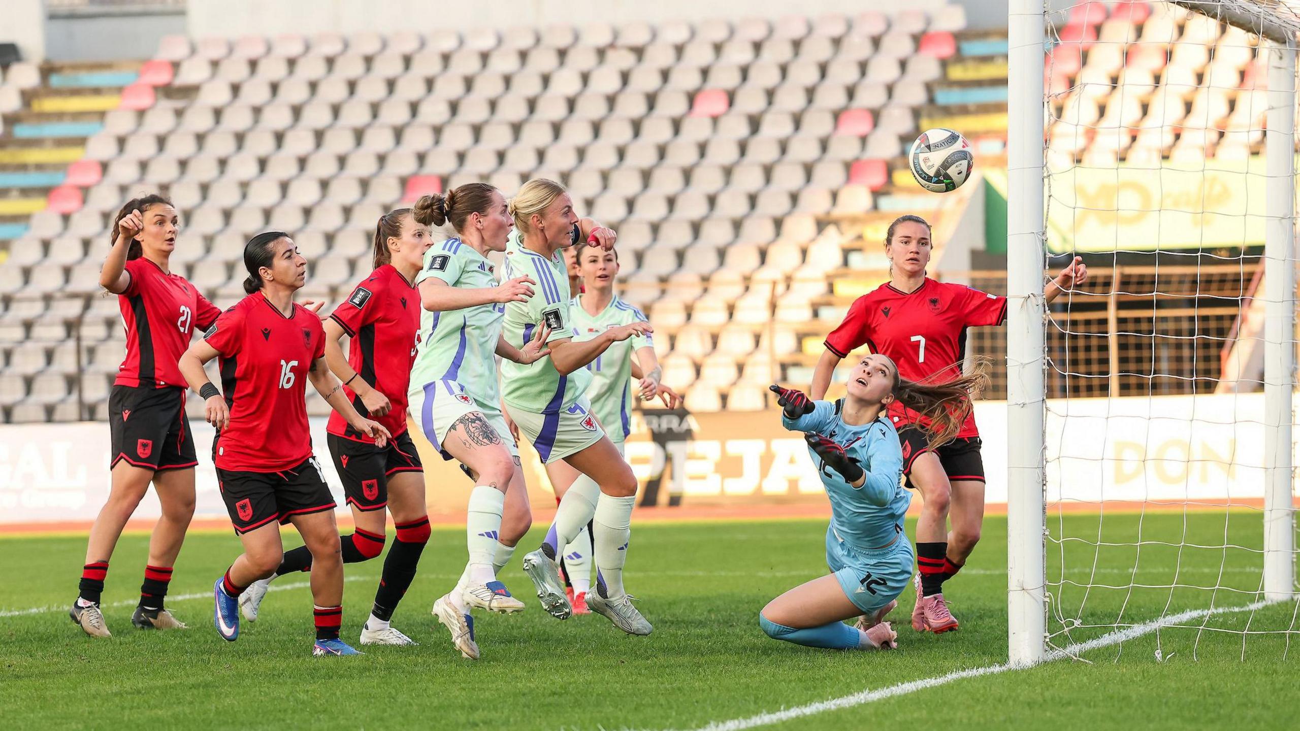 Sophie Ingle heads into the net