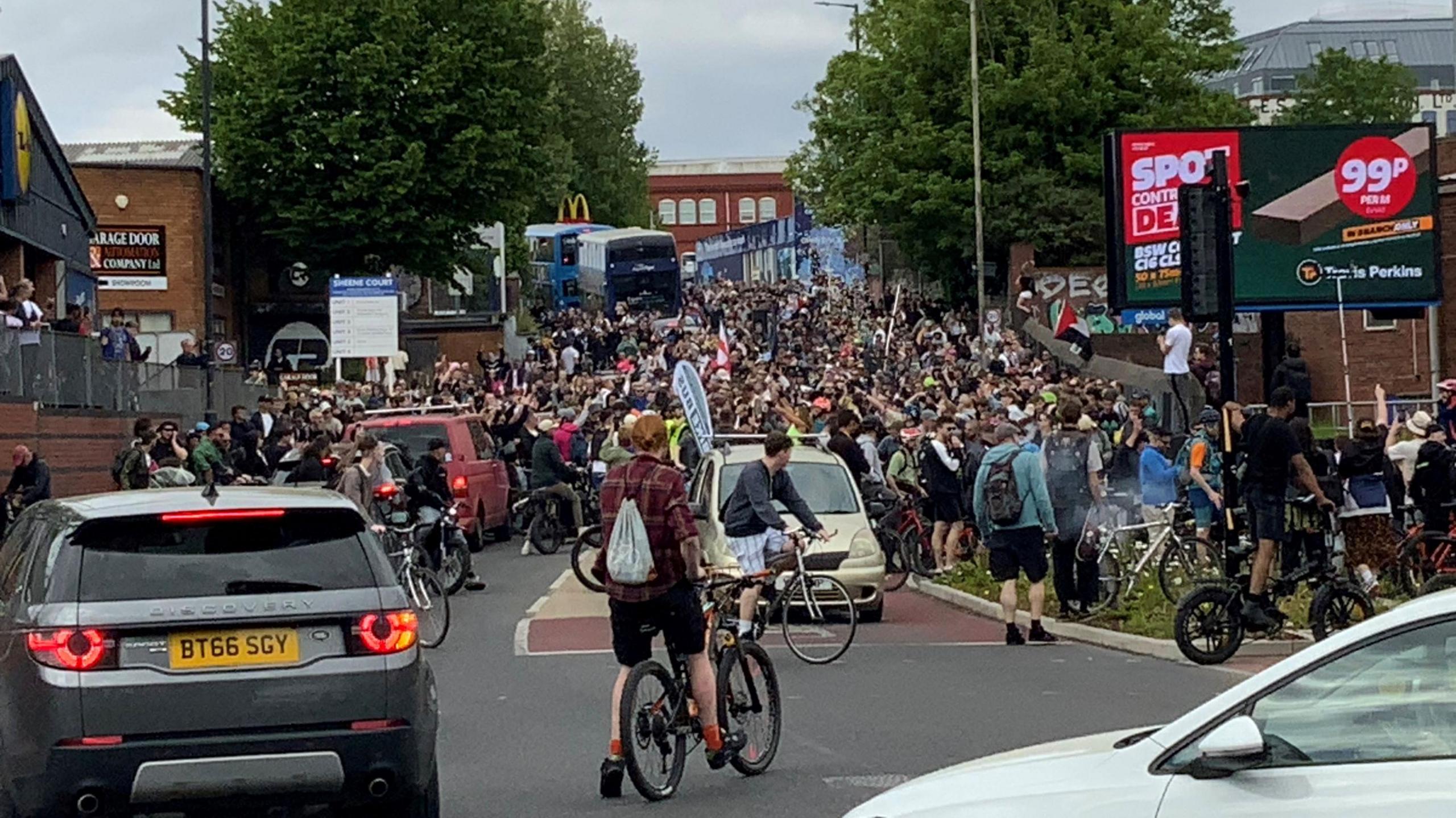 Hundreds of cyclists are seen causing congestion on a road in Bedminster in south Bristol during the Bristol Drum & Bass Bike Ride