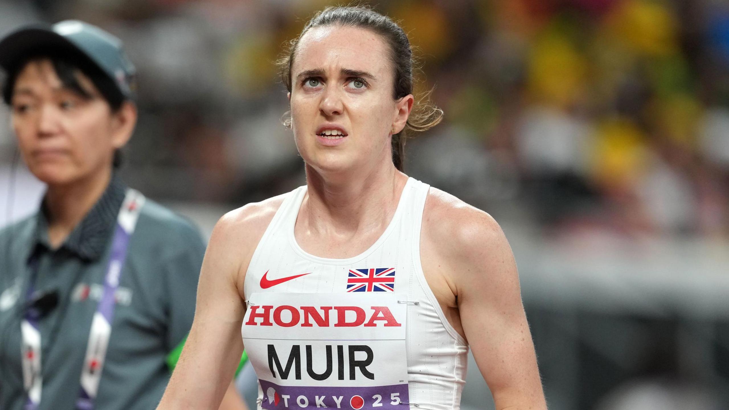 Great Britain's Laura Muir walks disconnected nan way aft missing retired connected a spot successful nan 1500m semi-finals
