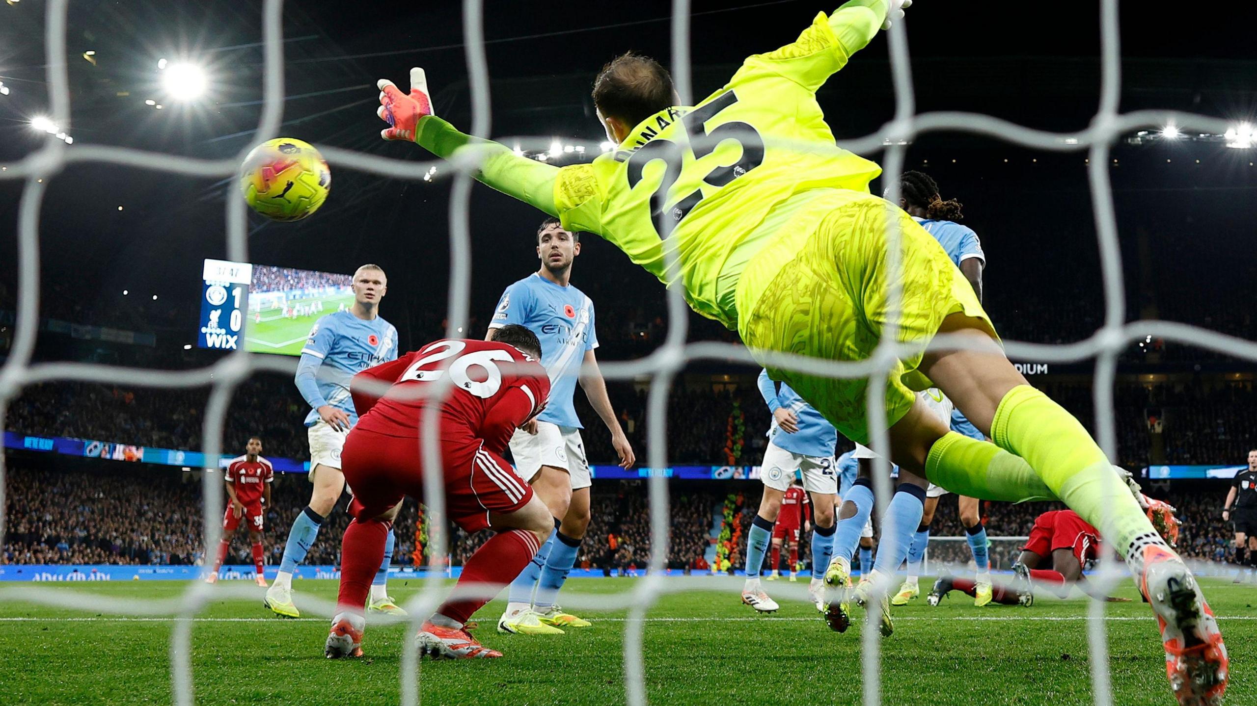 Andrew Robertson ducked out of the way of Virgil van Dijk's header to allow the ball to go into the net