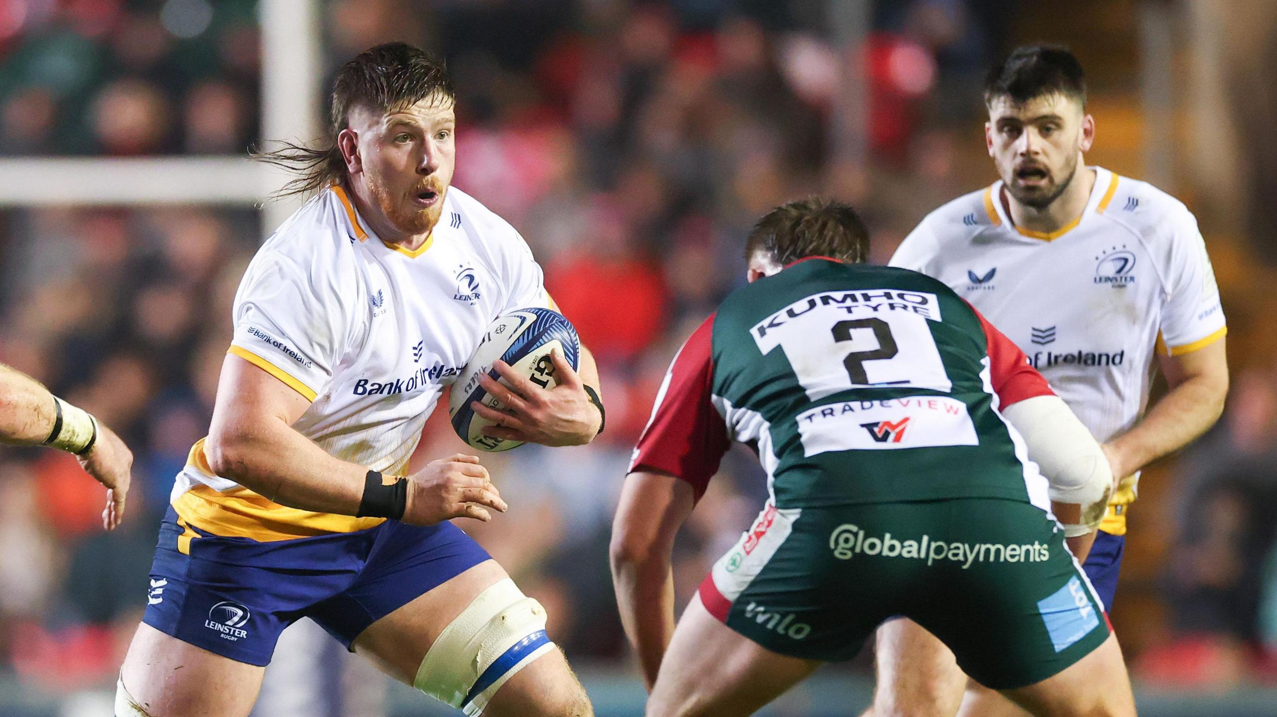 Joe McCarthy runs with the ball for Leinster