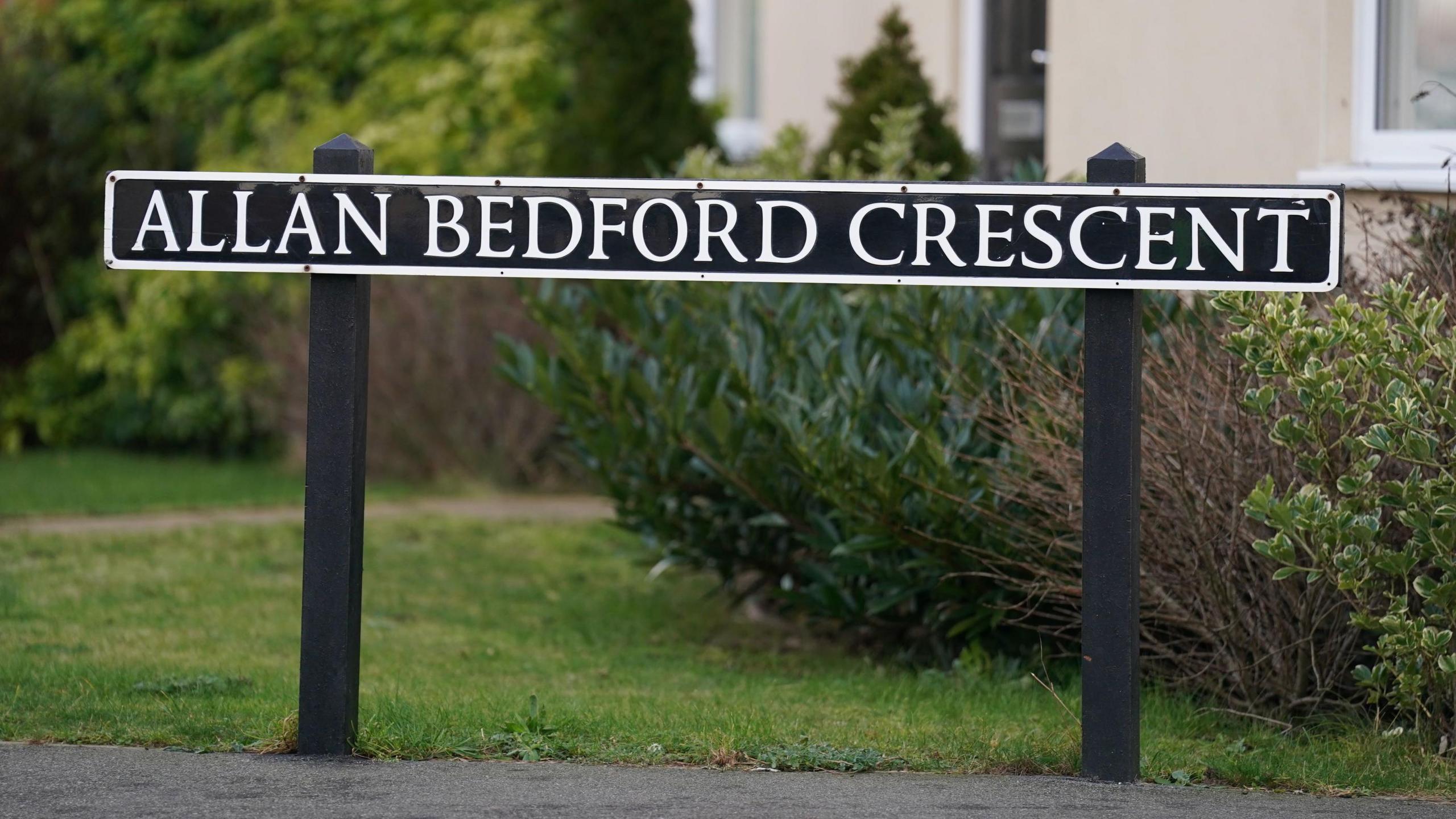 The road sign of ALLAN BEDFORD CRESCENT in Costessey near Norwich.