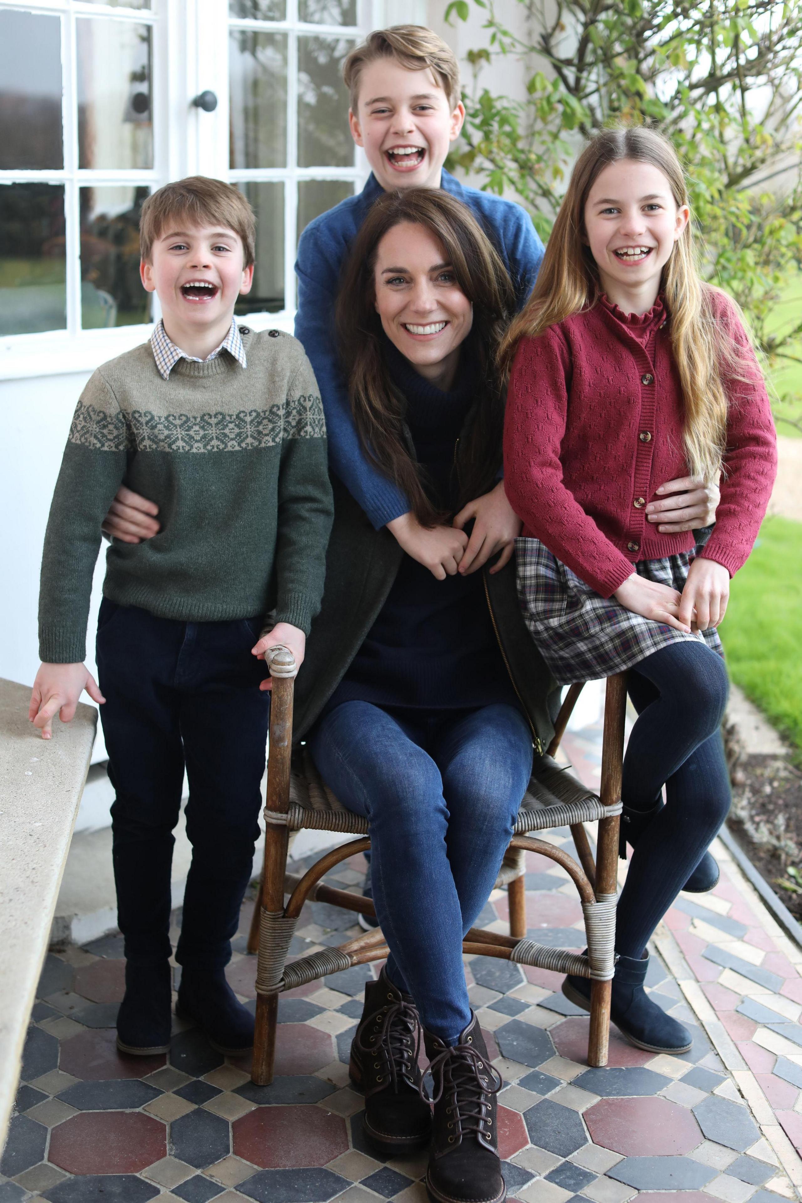 Kate with Prince Louis, Princess Charlotte and Prince George