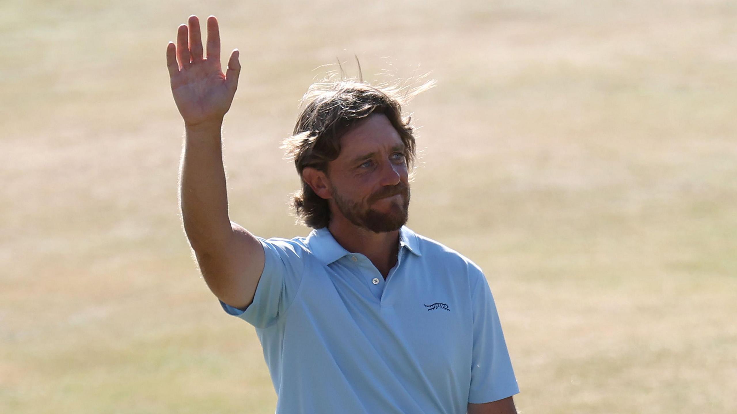 Tommy Fleetwood waves to the crowd at Royal Birkdale