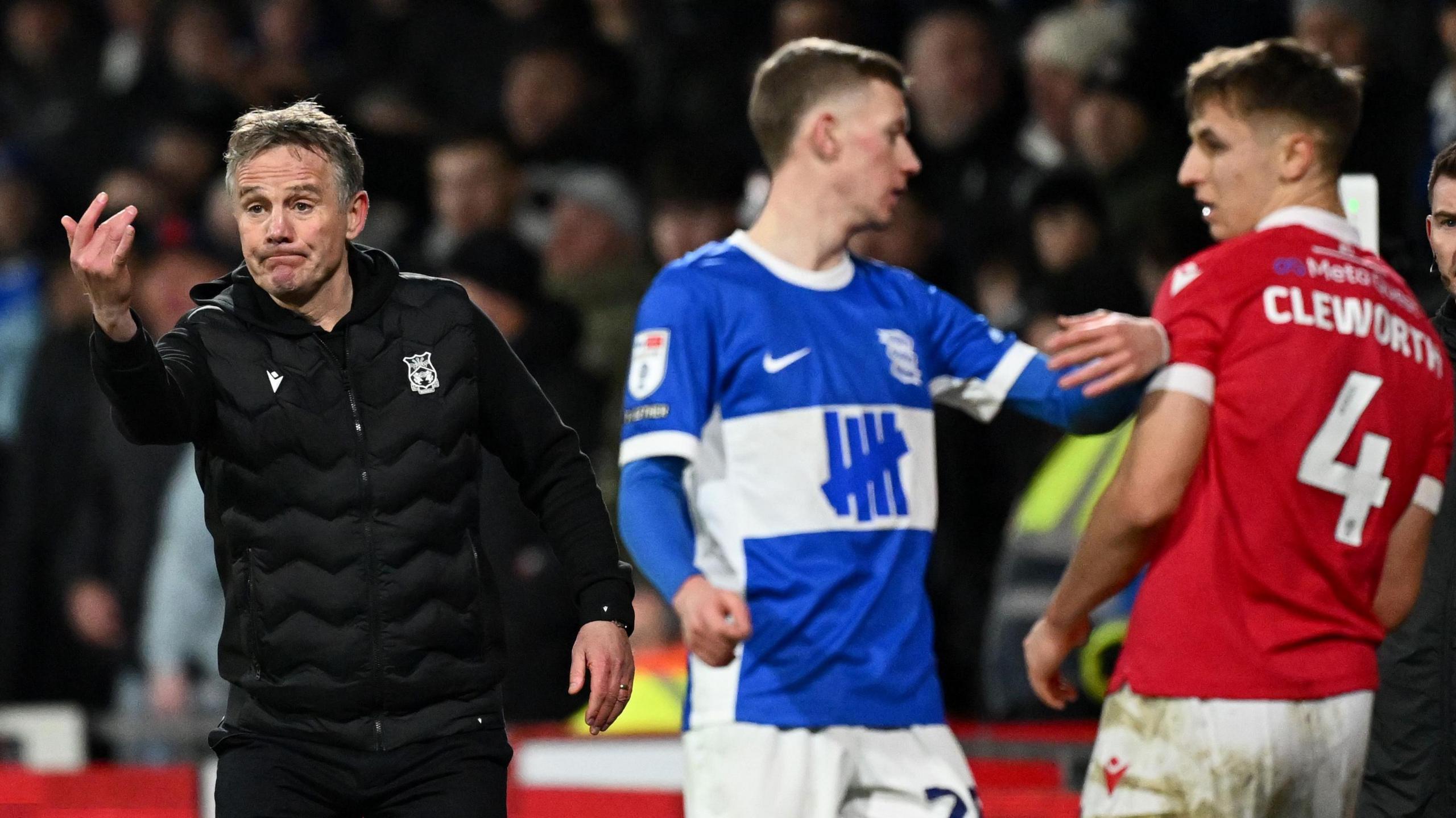 Phil Parkinson gives instructions to his players from the touchline during Wrexham's game against Birmingham City last season