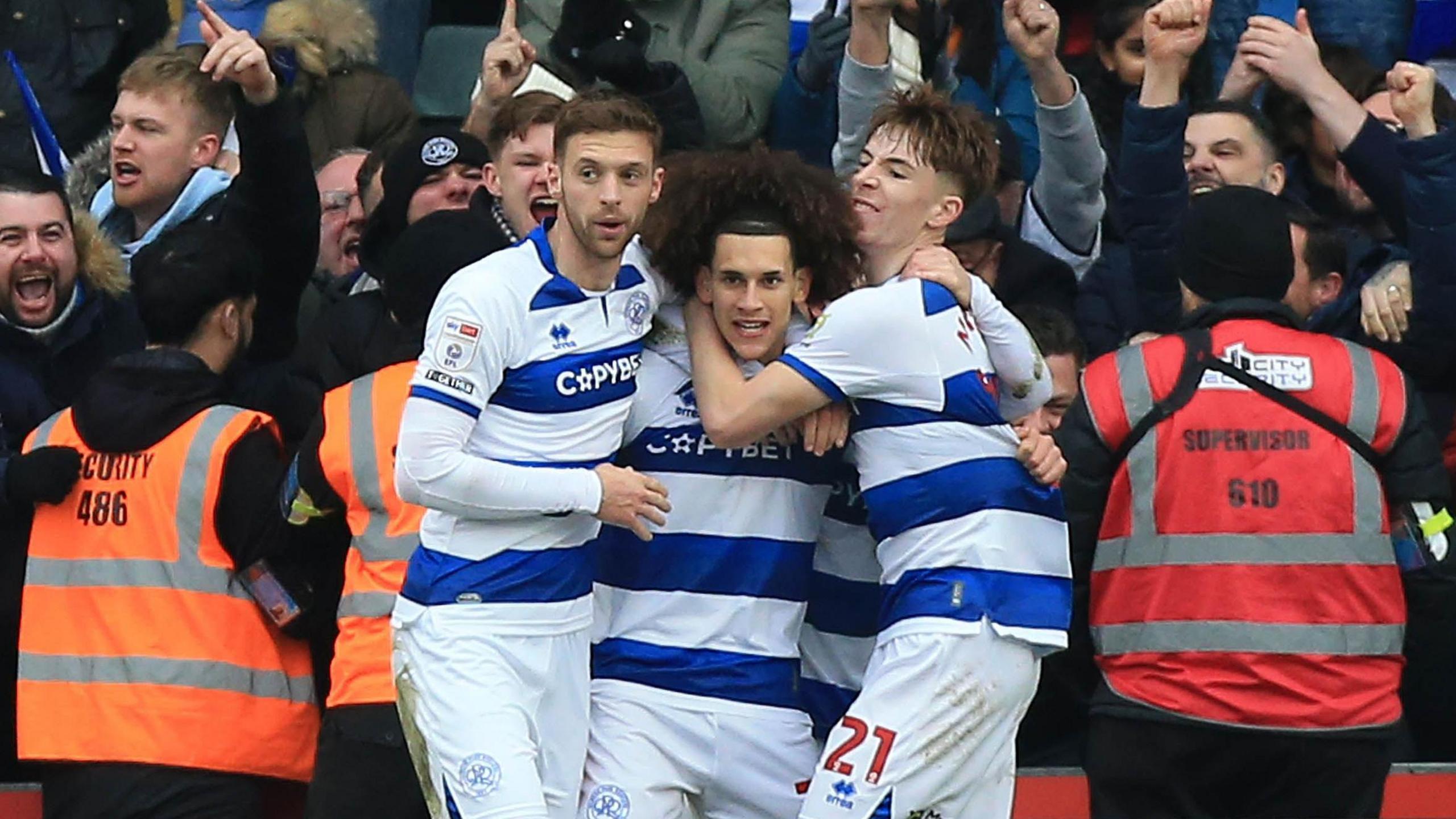 QPR celebrate Rayan Koll's goal