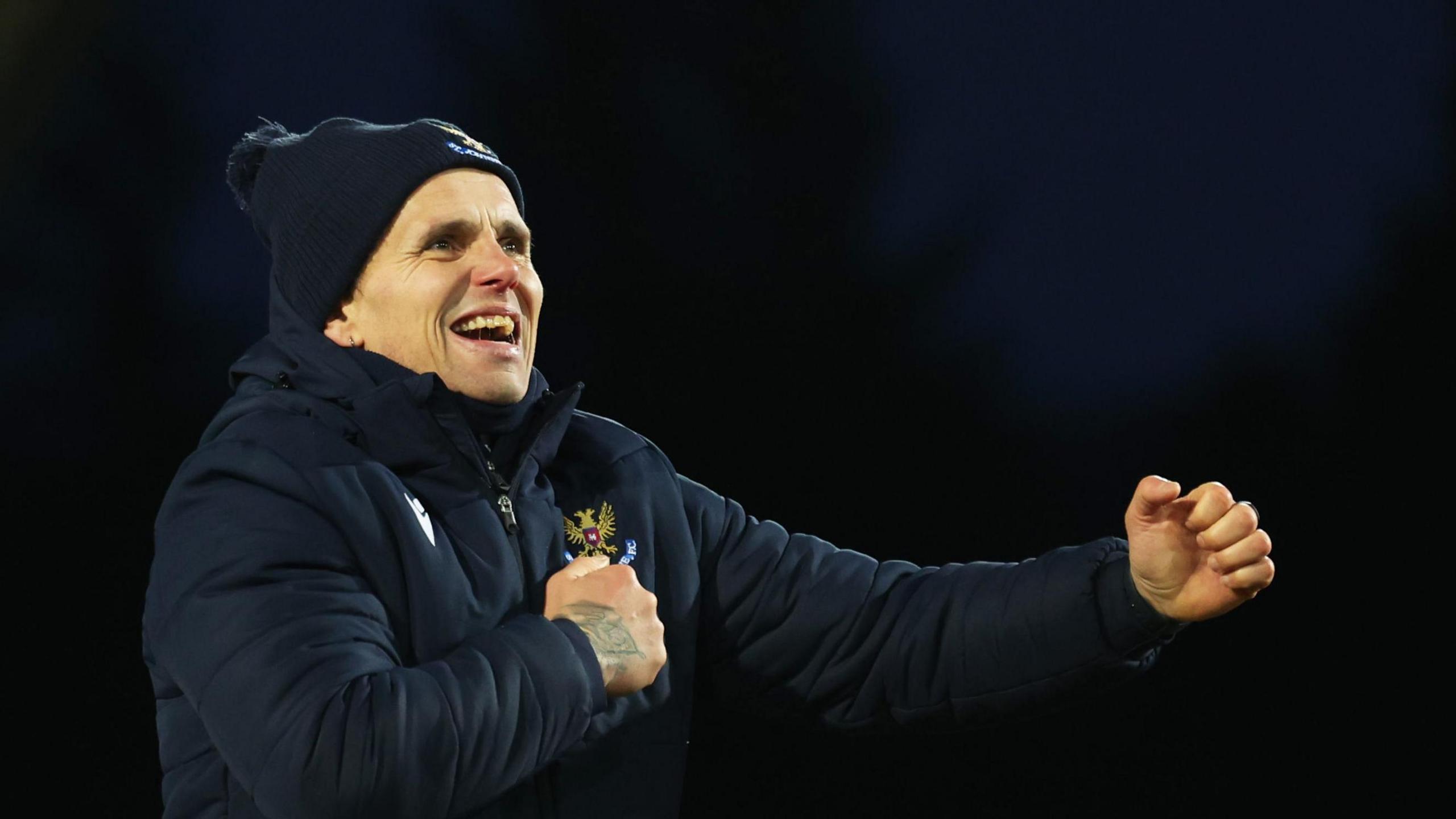 St Johnstone Manager Simo Valakari celebrates at Full Time during a William Hill Premiership match between St Johnstone and Motherwell at McDiarmid Park