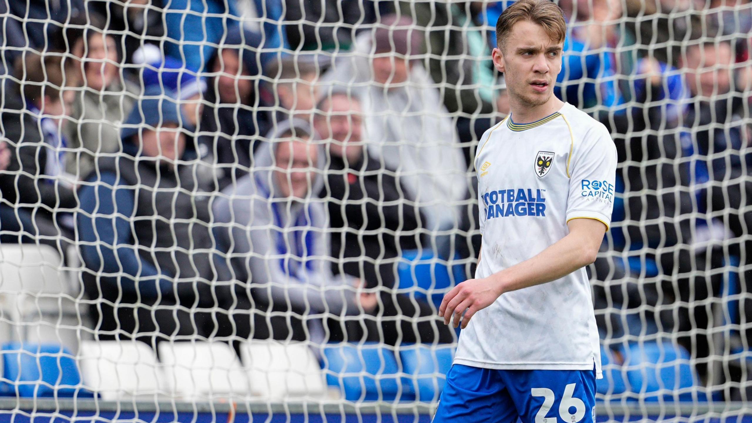 Jack Currie in action for AFC Wimbledon 